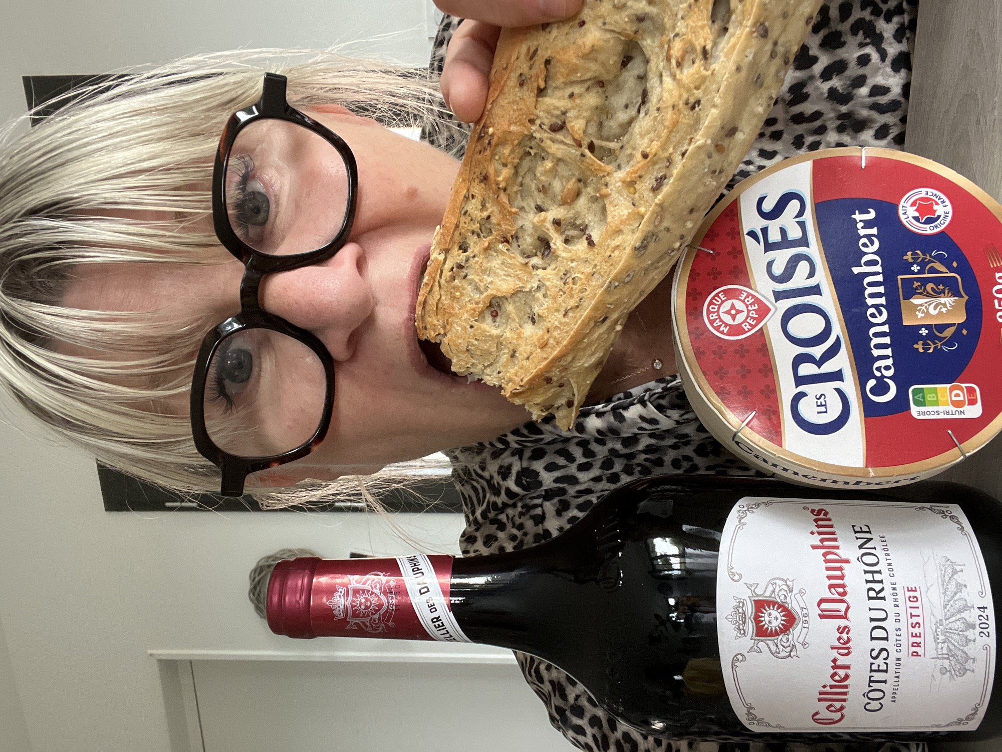 Woman enjoys wine and meal in Chambœuf, France