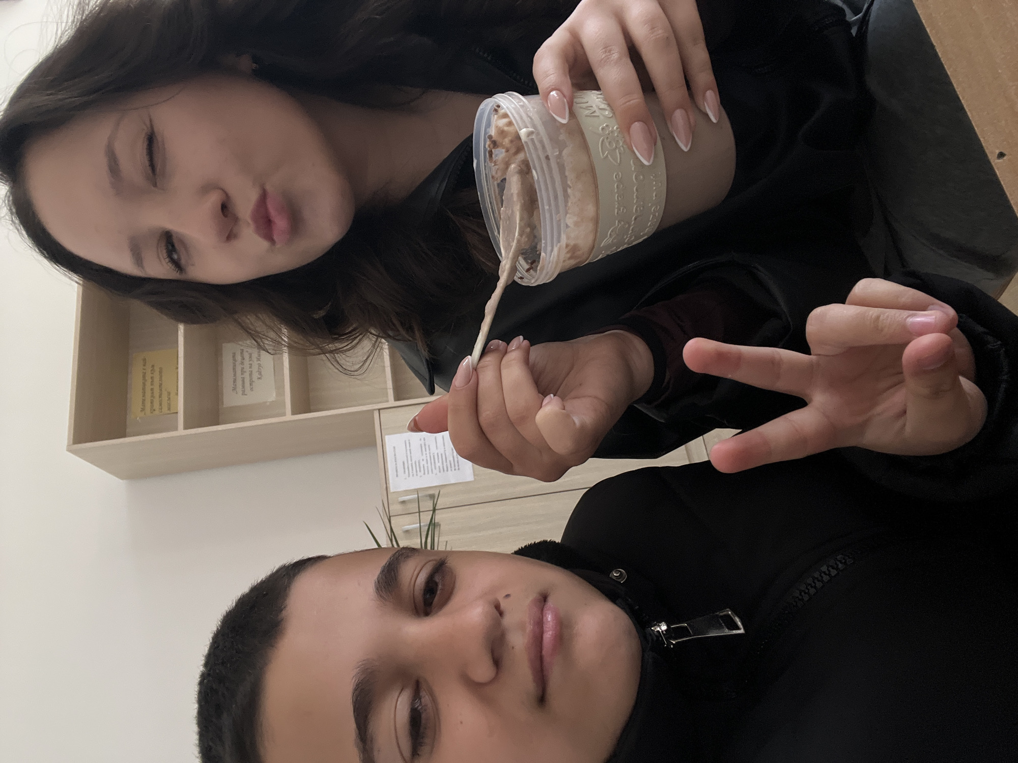 Two people share morning beverages in Karnobat, Bulgaria