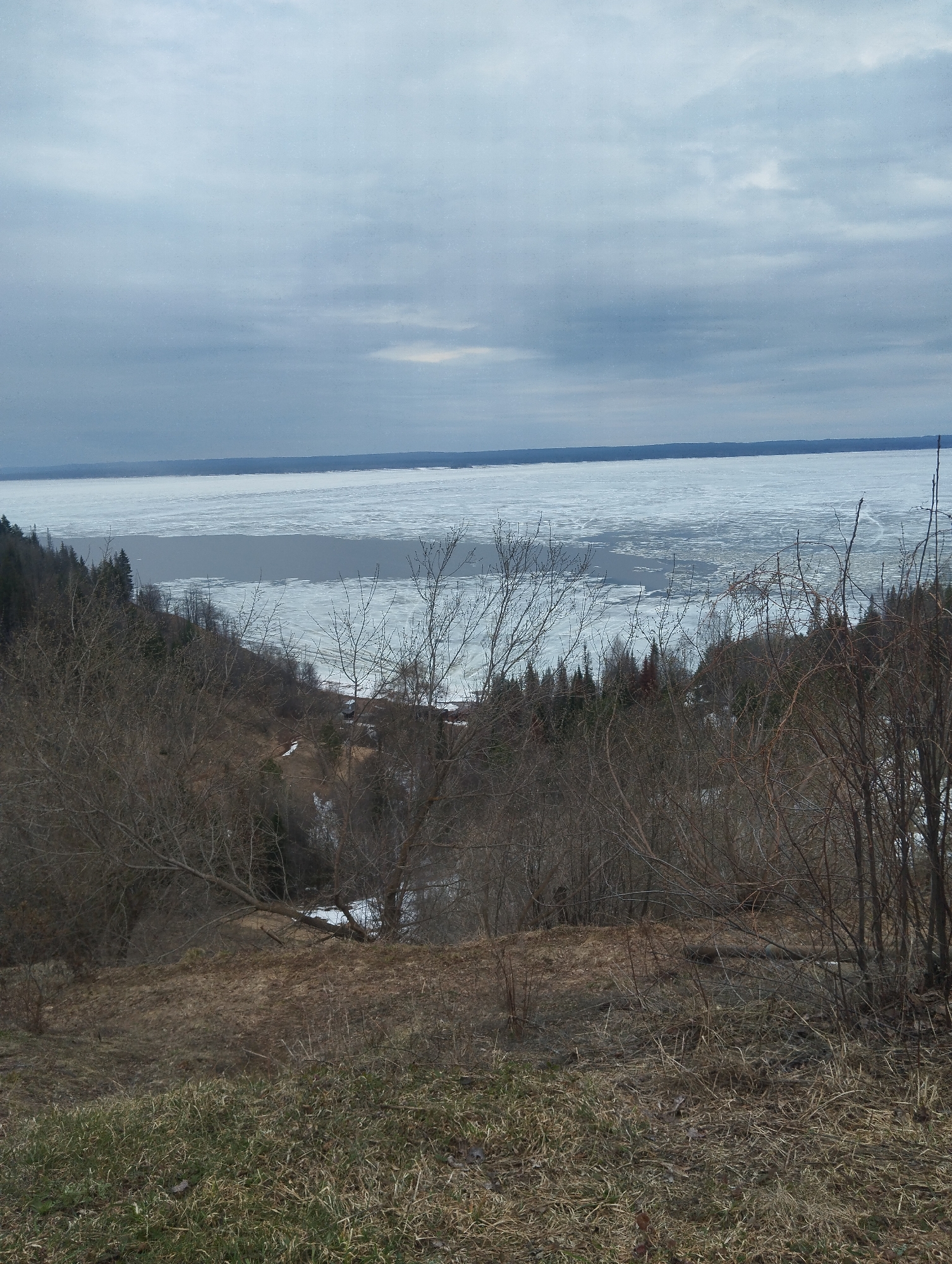 Woman photographed at ice-covered water viewpoint in Галево, Russia
