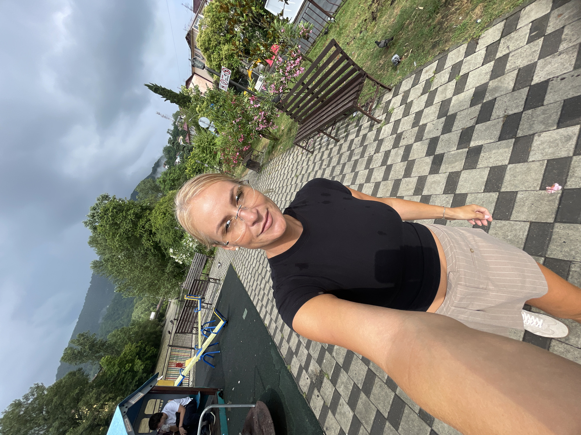 Afternoon stroll along Sochi's muddy riverbank and park
