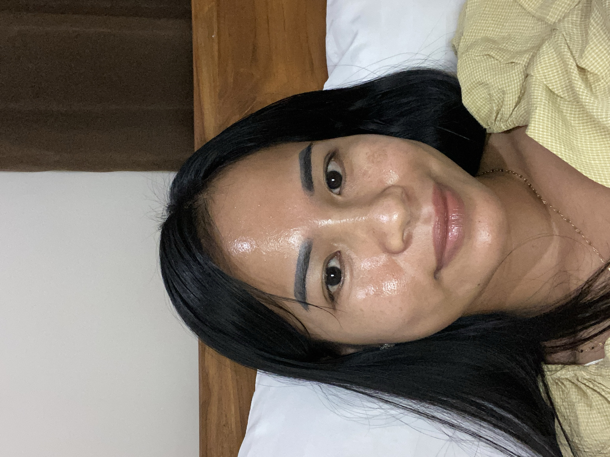 Woman photographed in portrait while resting in North Kuta