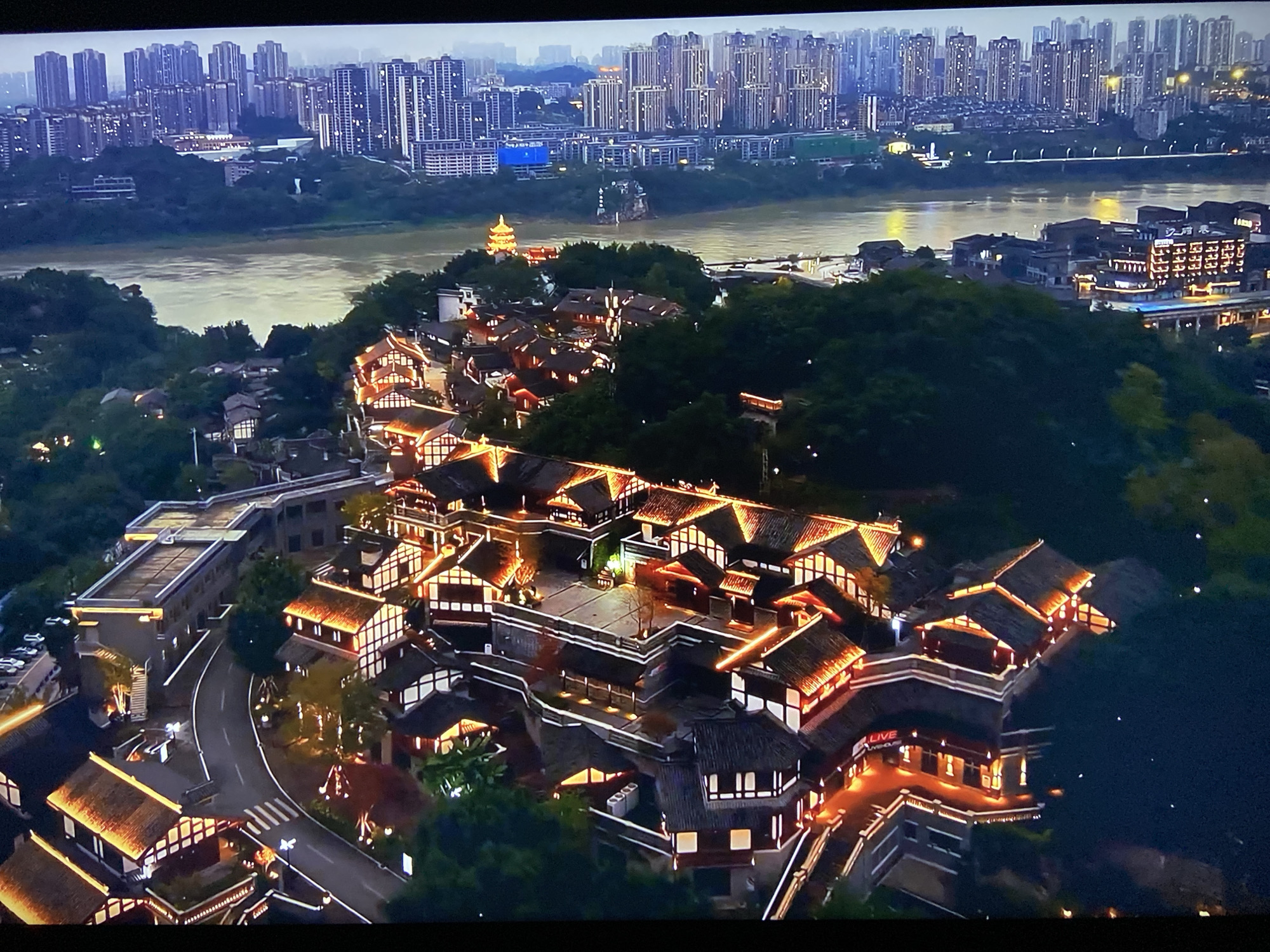 Aerial view captures illuminated Chinese architecture at night