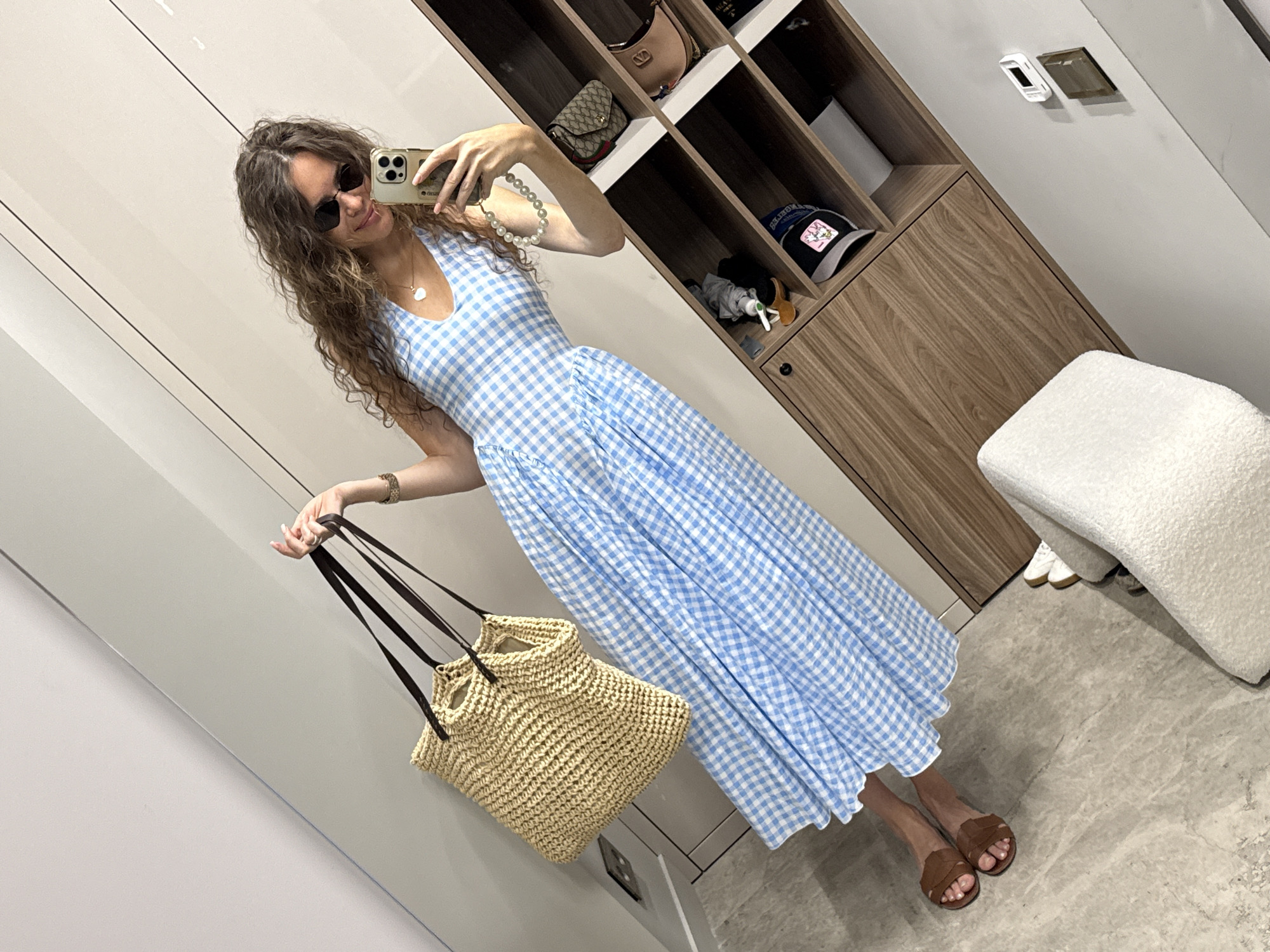 Mirror selfie in a Moscow dressing room, checkered midi dress