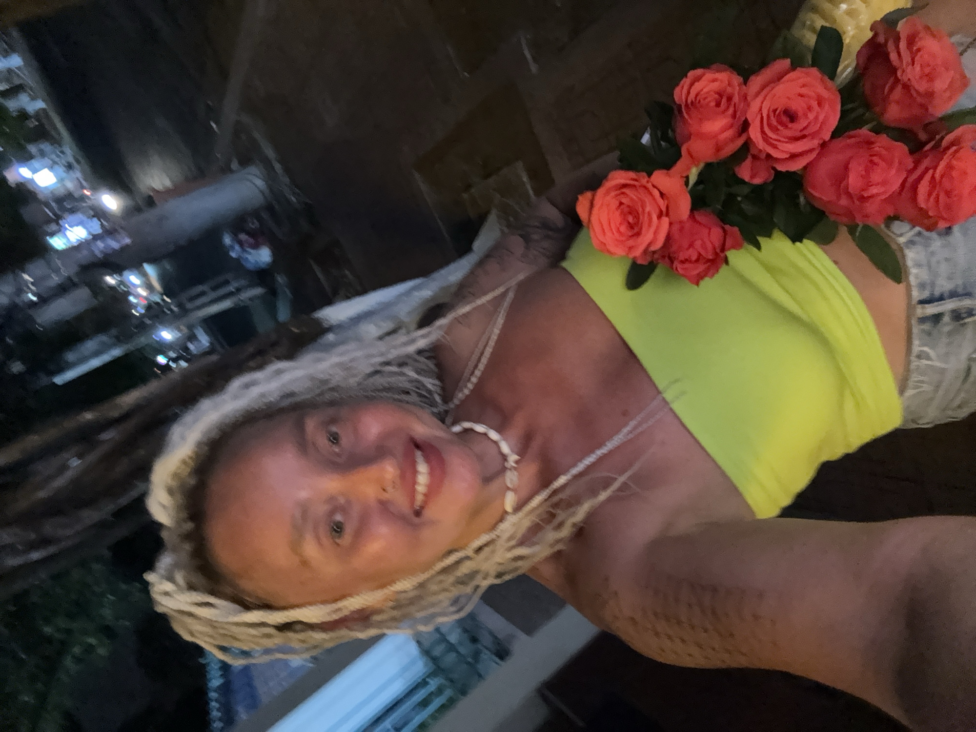 Selfie moment with orange roses in Nha Trang
