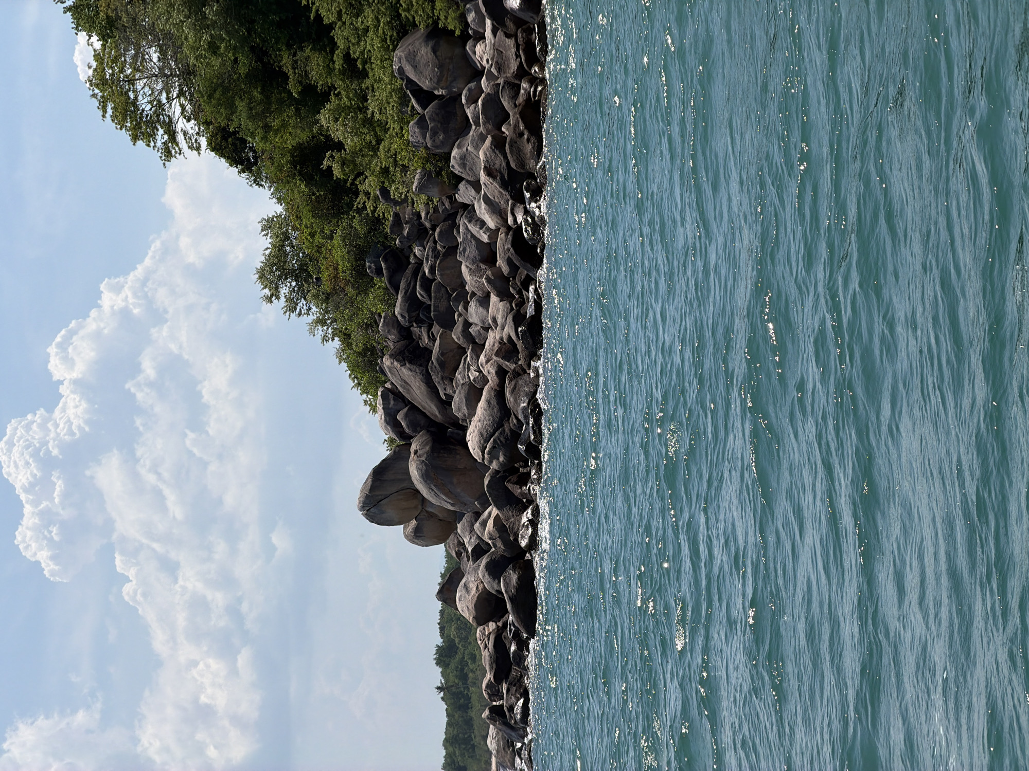 Nha Trang's rocky coastline and turquoise water, morning light