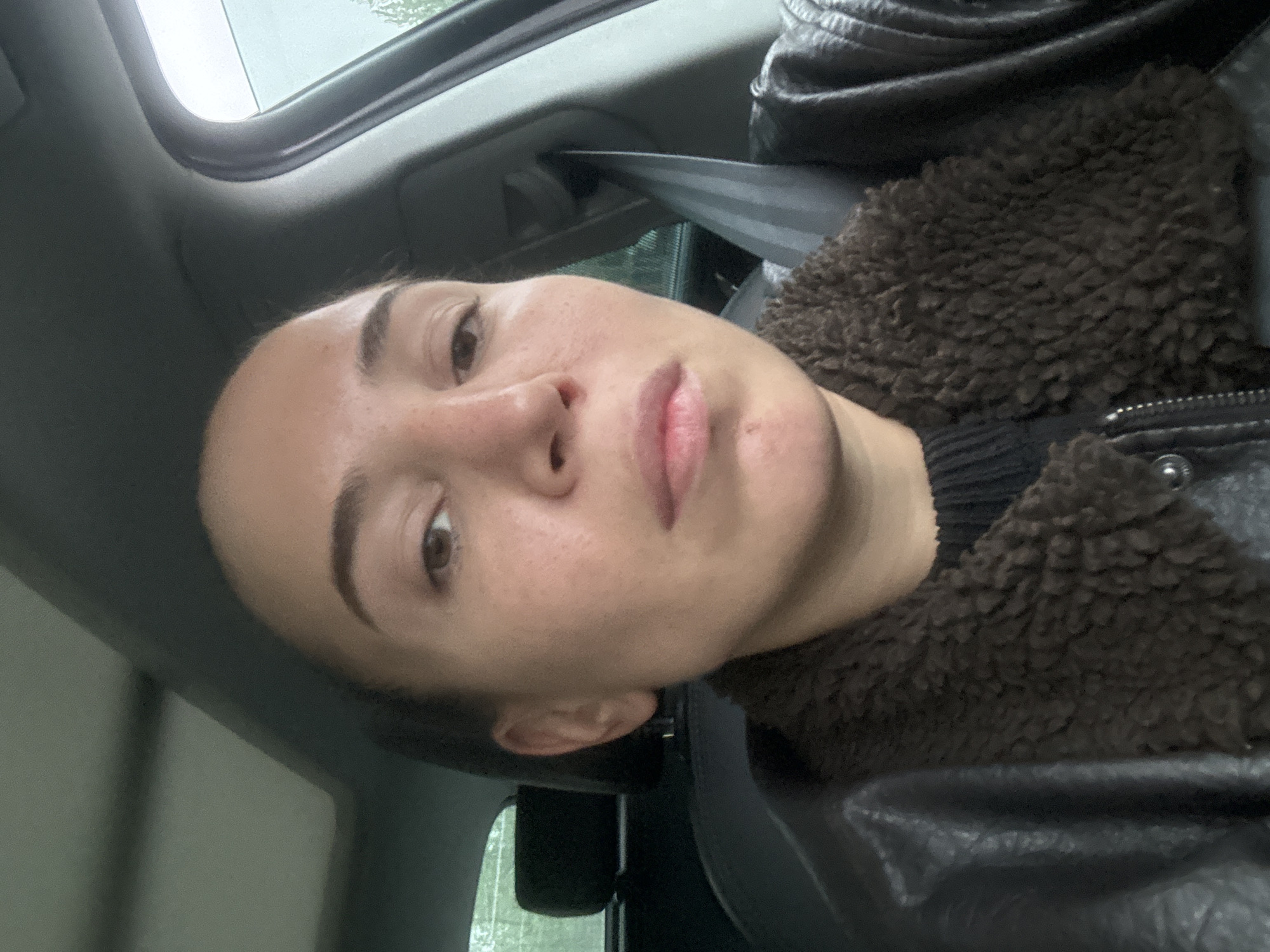 Woman in dark jacket observed in vehicle in Moscow