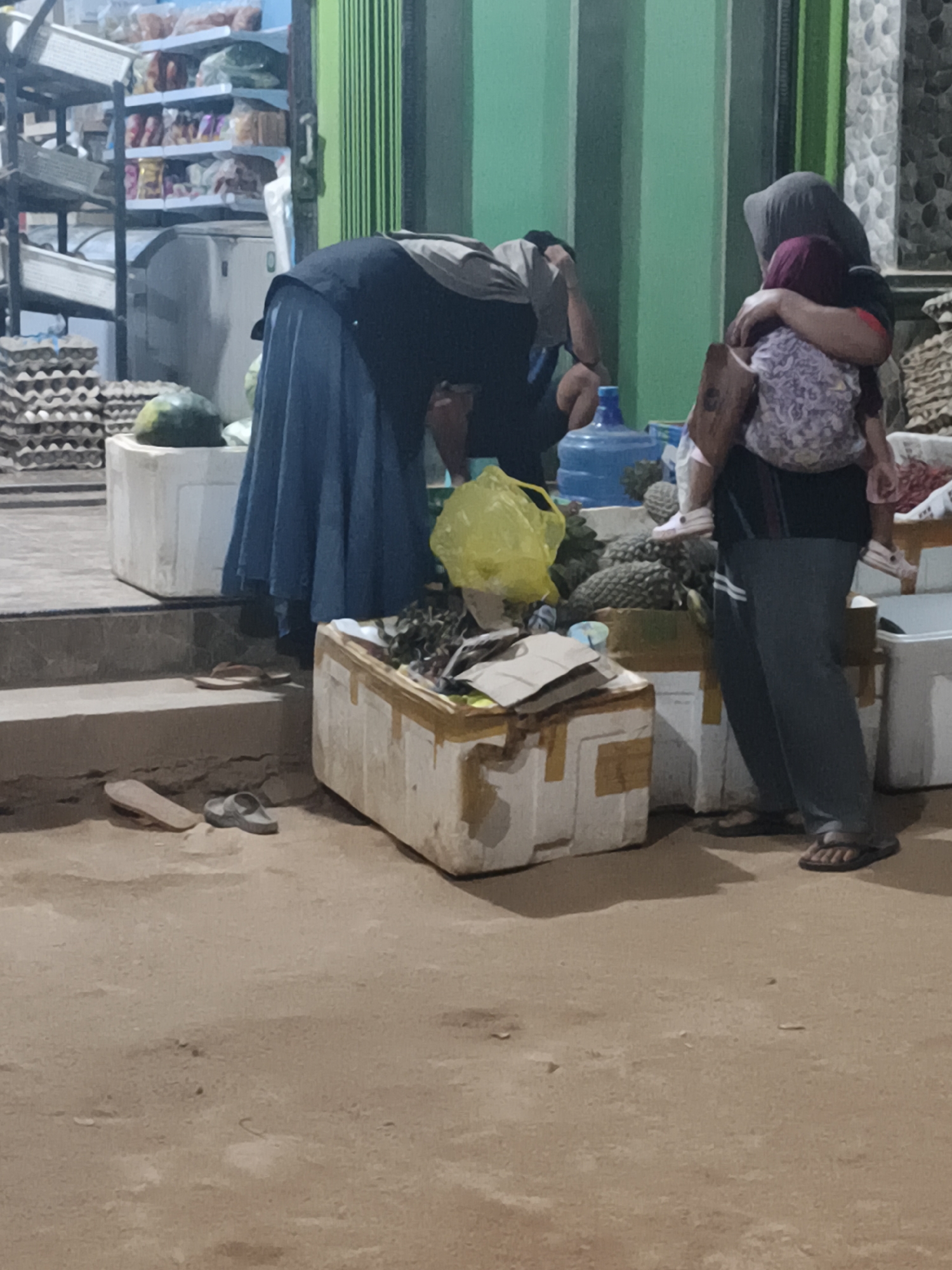 Market day and street commerce in Selimantan Jaya, Indonesia