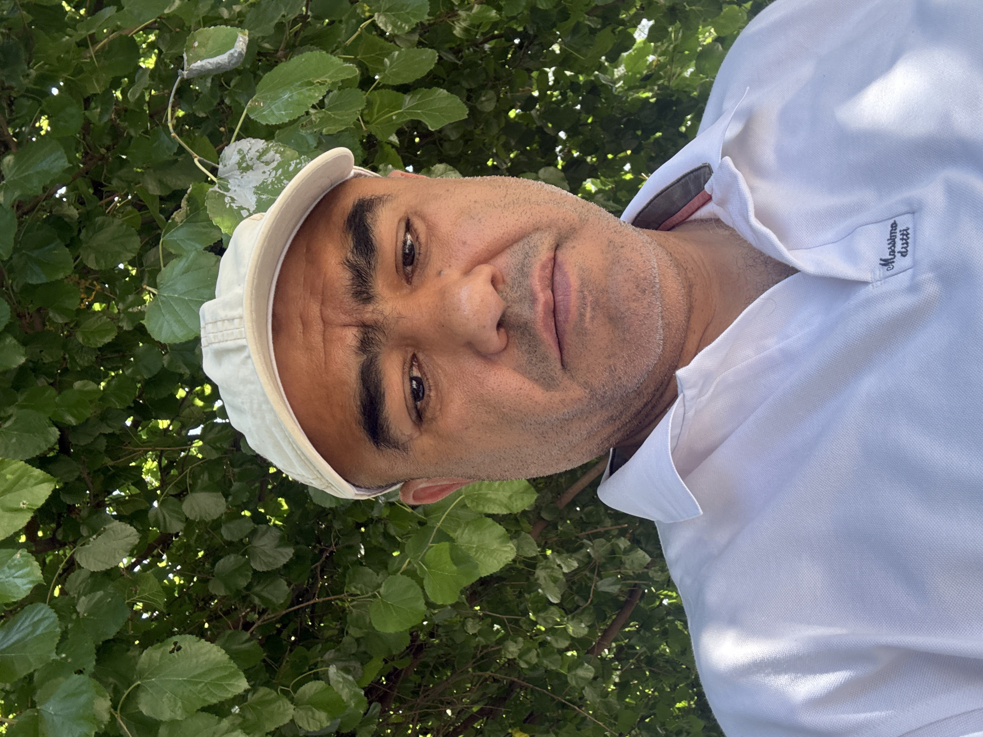 Selfie series among green foliage in Tashkent