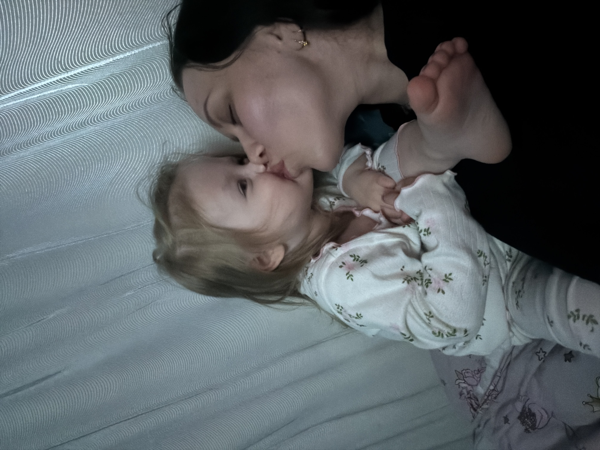 Mother and child share bedtime moments in Perm