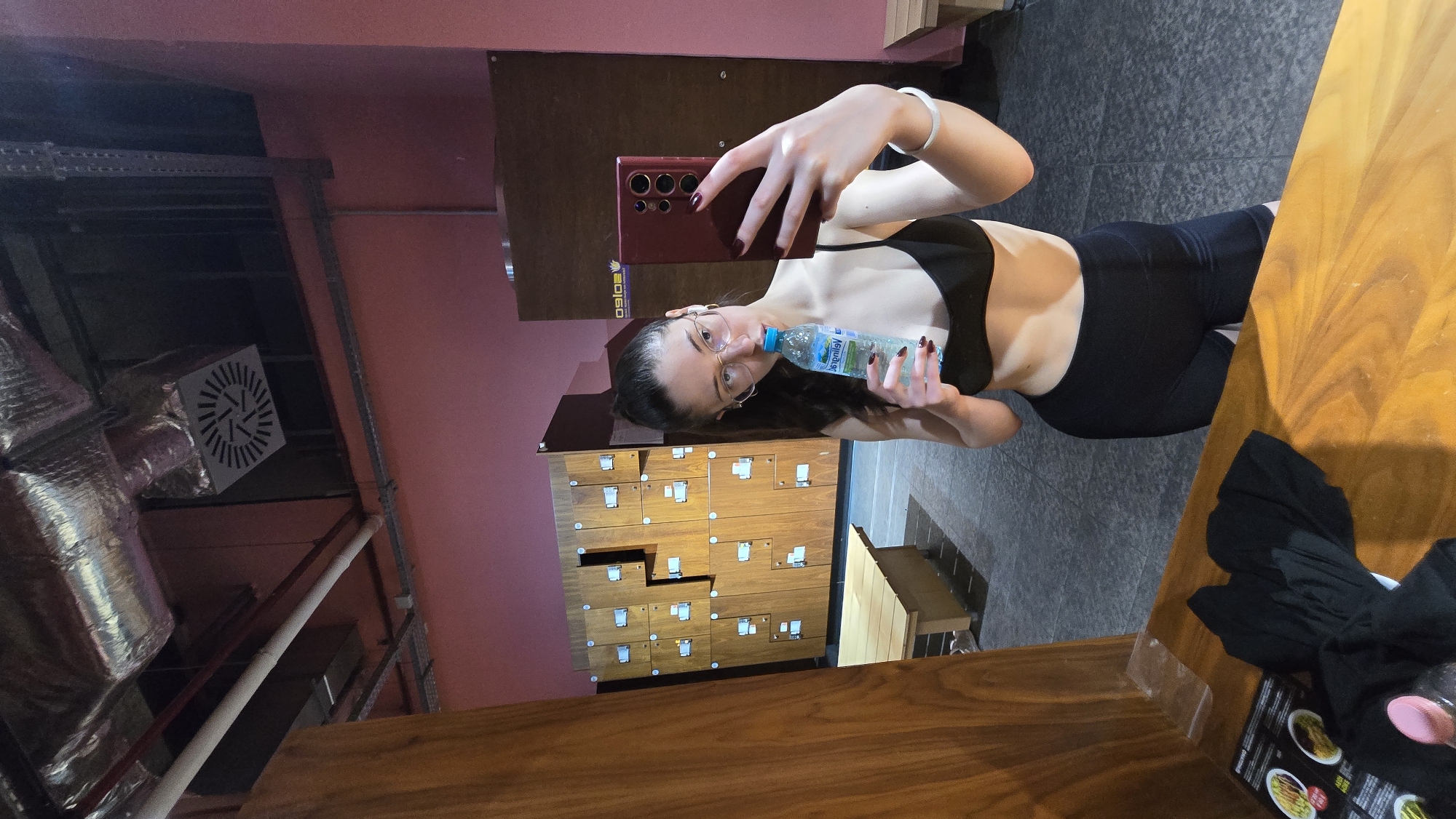 Woman takes fitness selfies in Stara Zagora gym facility