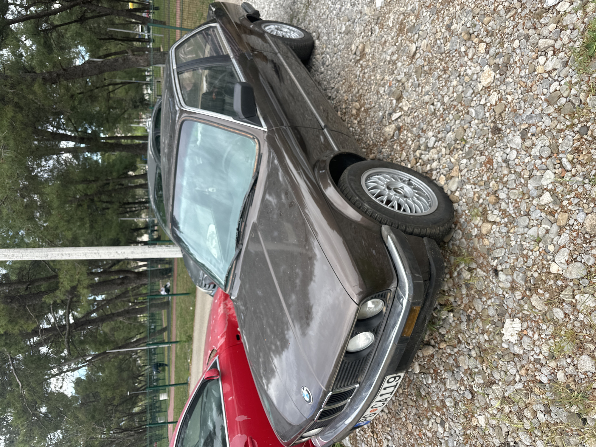 BMW E30 spotted parked on gravel in Podgorica