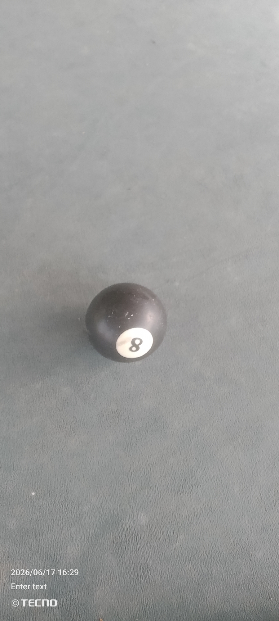 Billiard balls photographed across a pool table session