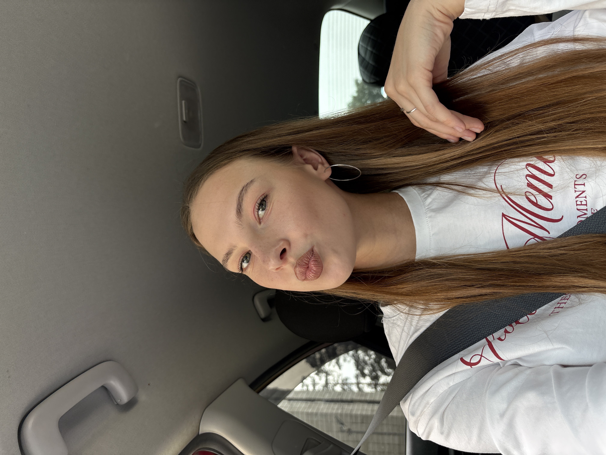Passenger seat selfies and shoe shots from a car in Perm
