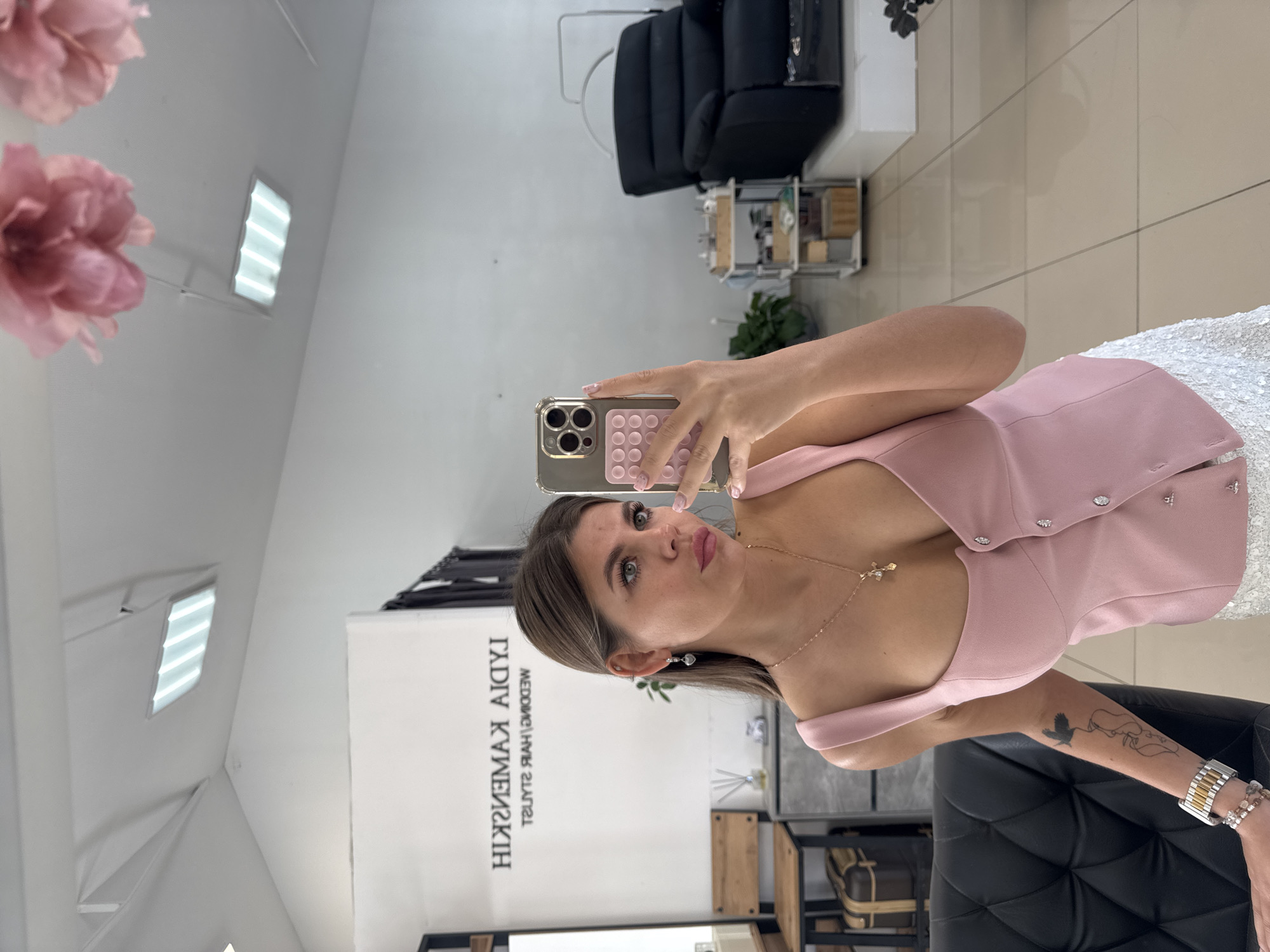 Mirror selfies at a Chaikovsky beauty salon, sequined skirt in frame