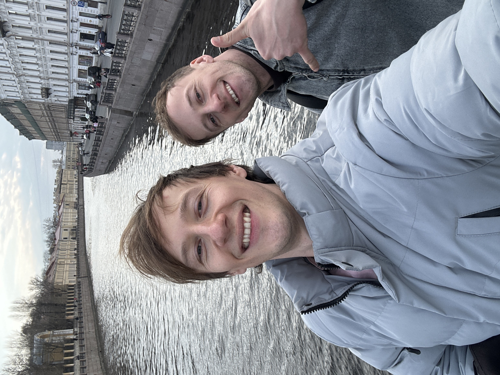 Tourists take selfies near Saint Petersburg landmark and karaoke bars