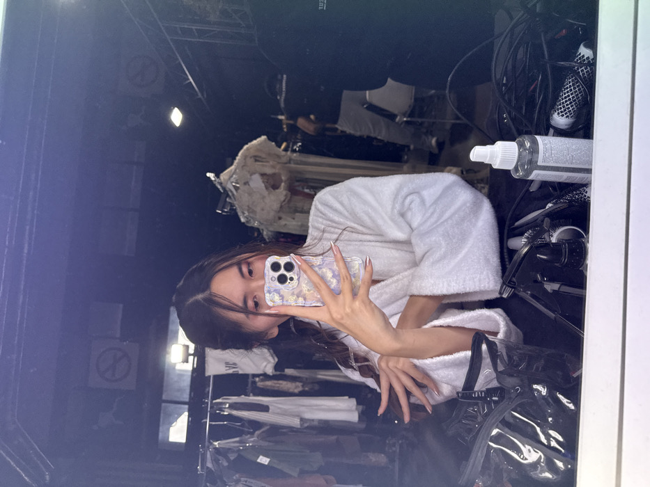 Person takes mirror selfies in bathrobe in Issy-les-Moulineaux