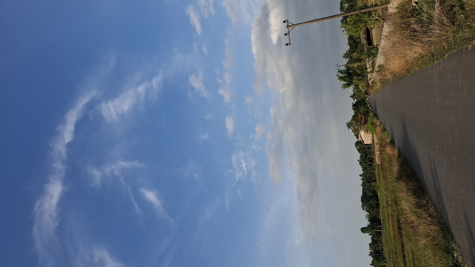Open road and big skies in rural Grong-grong, Indonesia