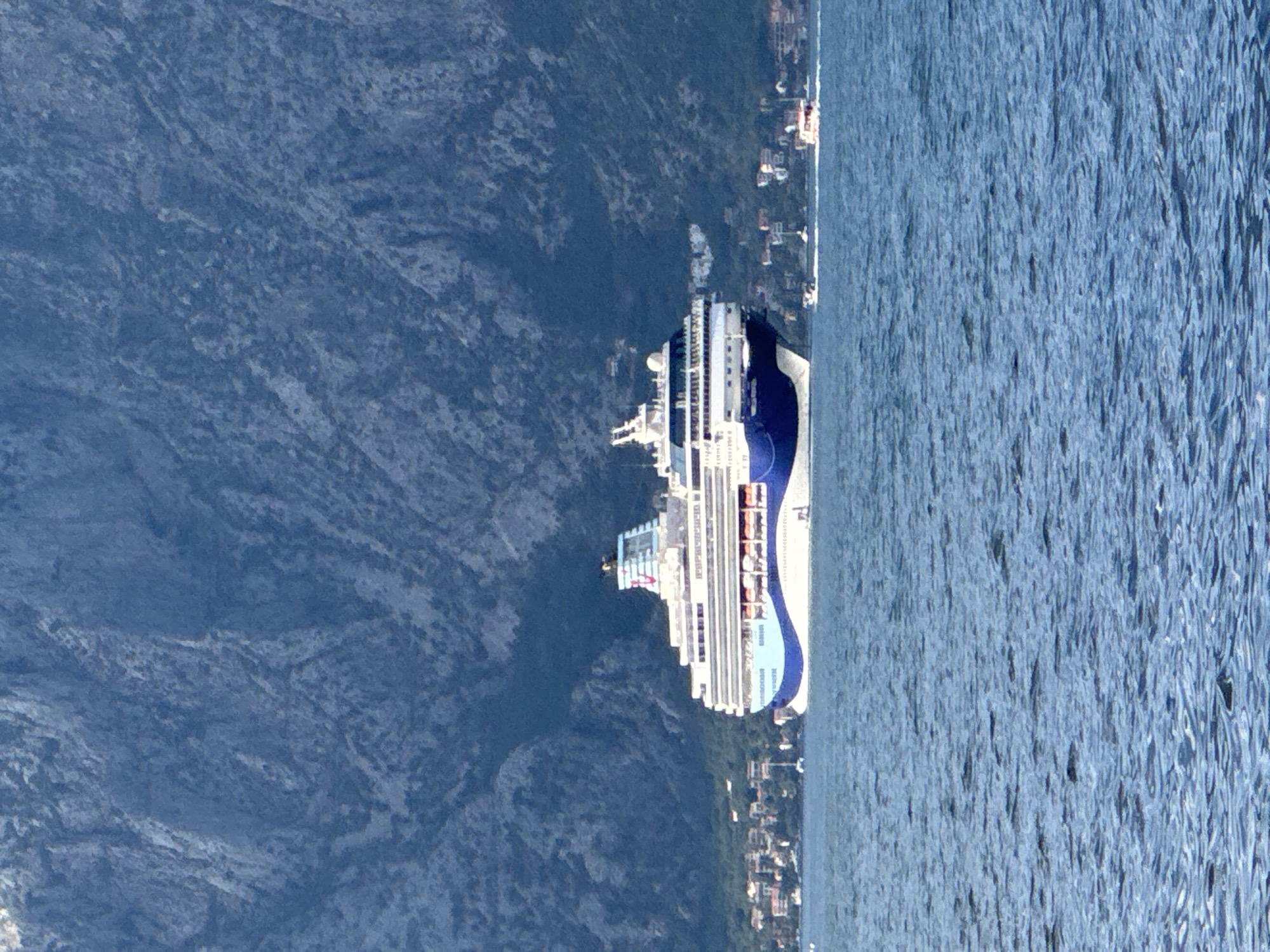 Bay of Kotor waterfront busy with ships on a summer afternoon