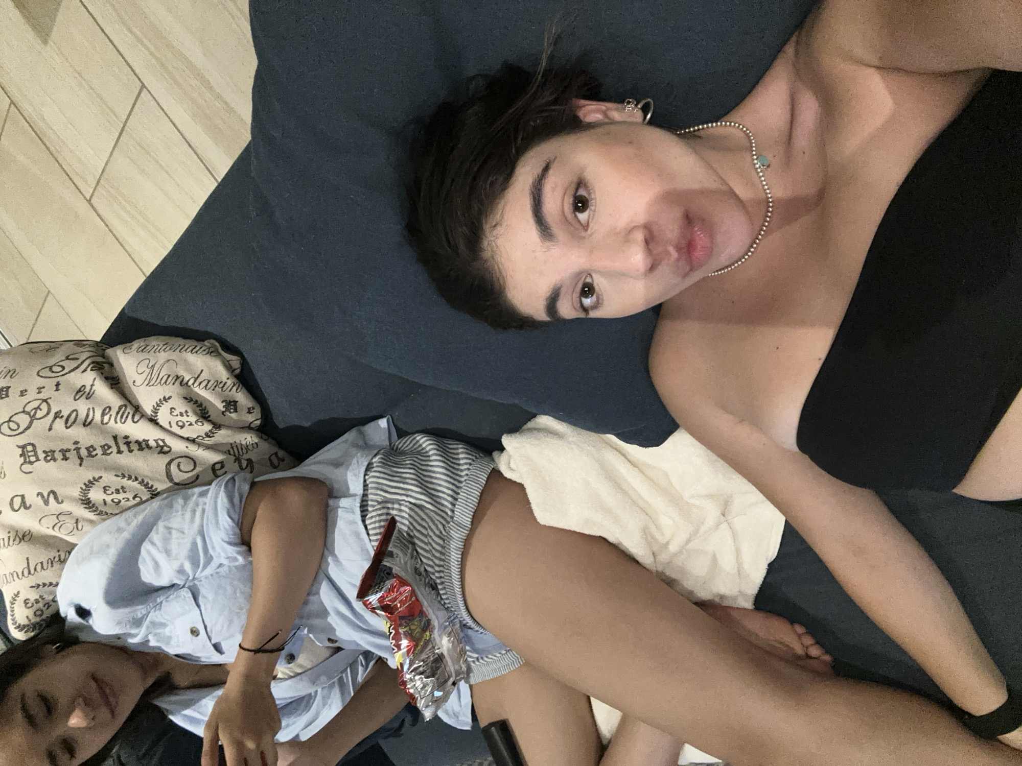 Woman takes late-night selfies on sofa in Acapulco