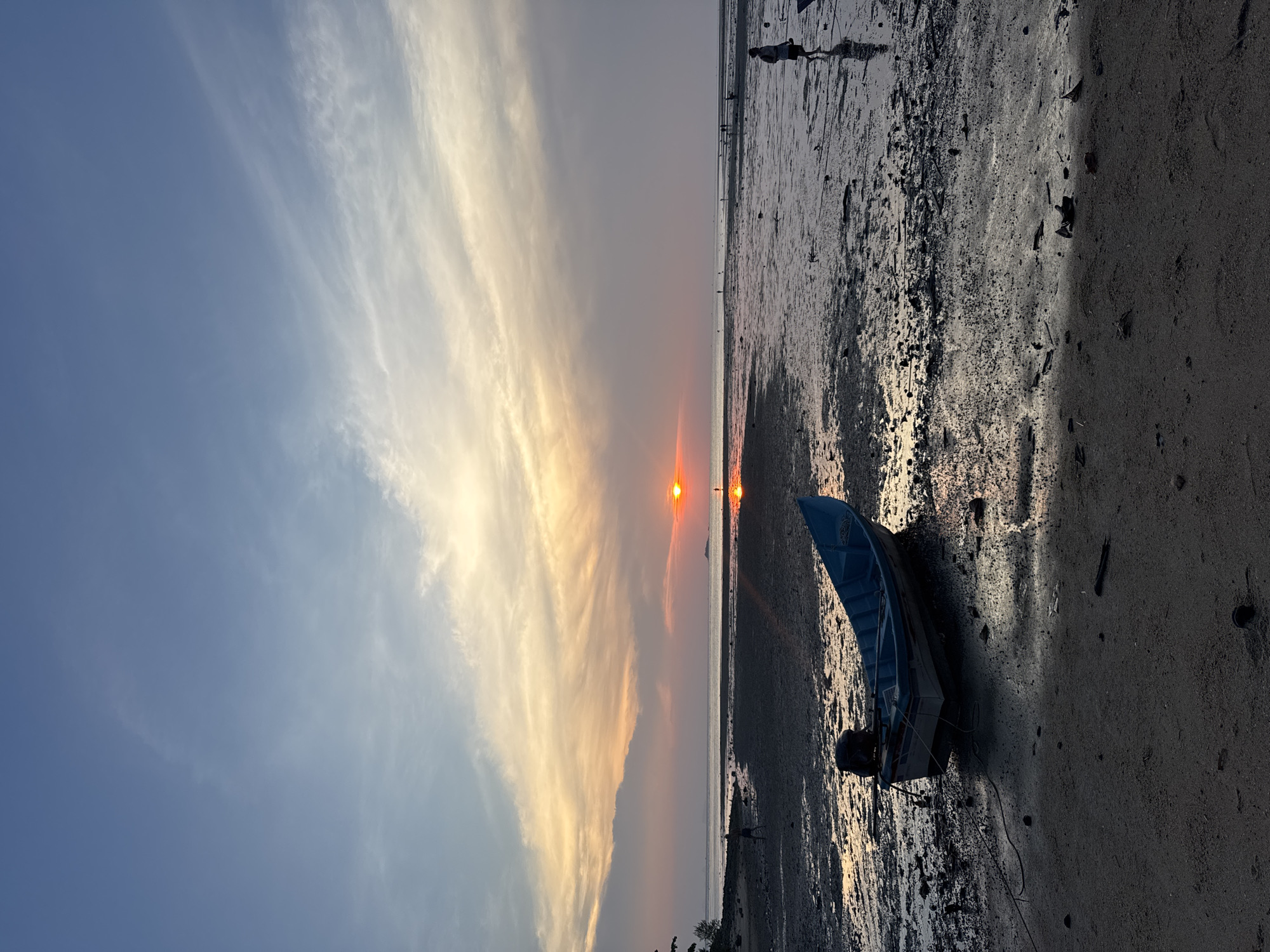 Sunset fishing boats documented at Thai coastal village