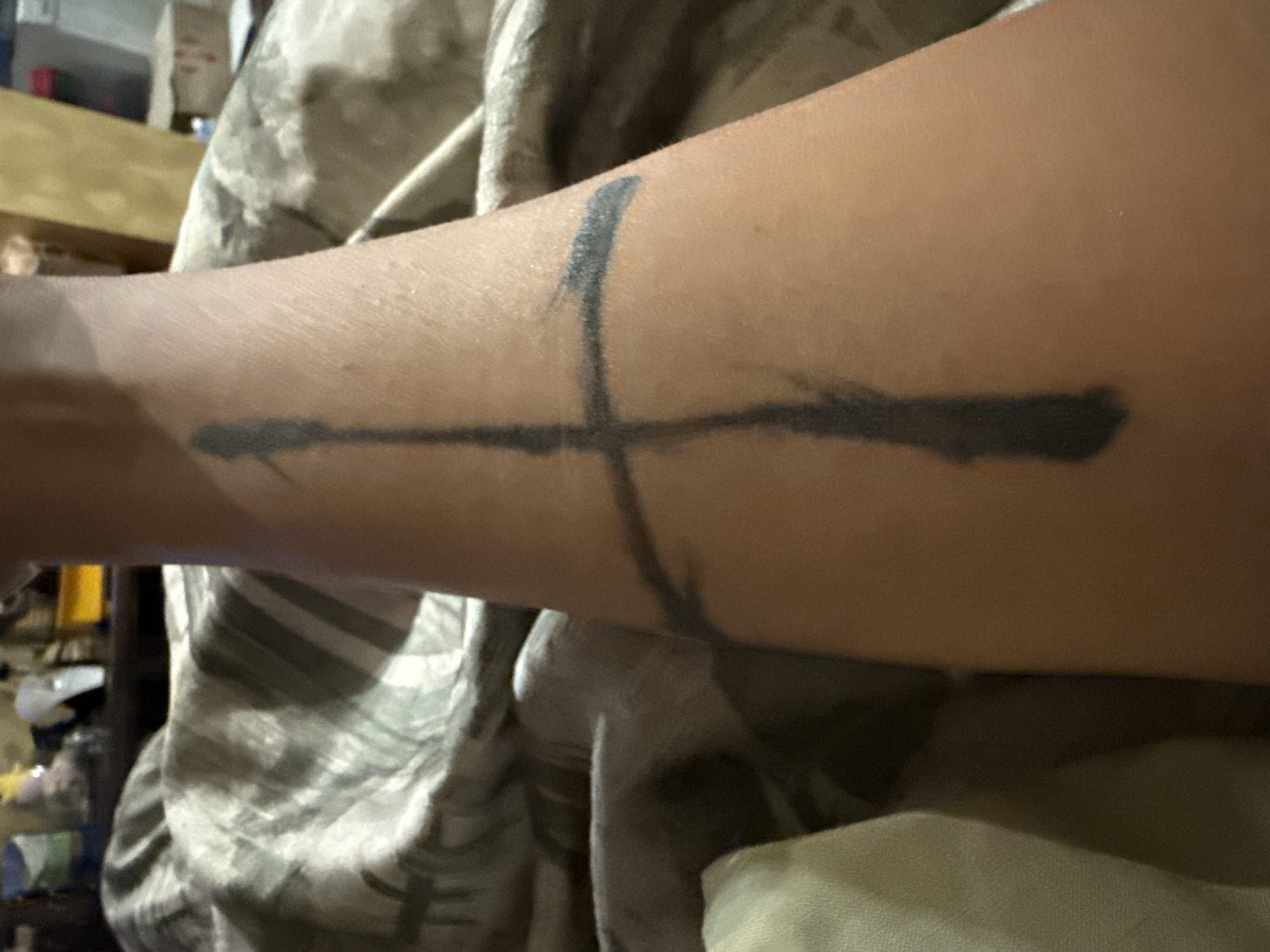 Tattoo close-ups and a quiet indoor corner in Odesa