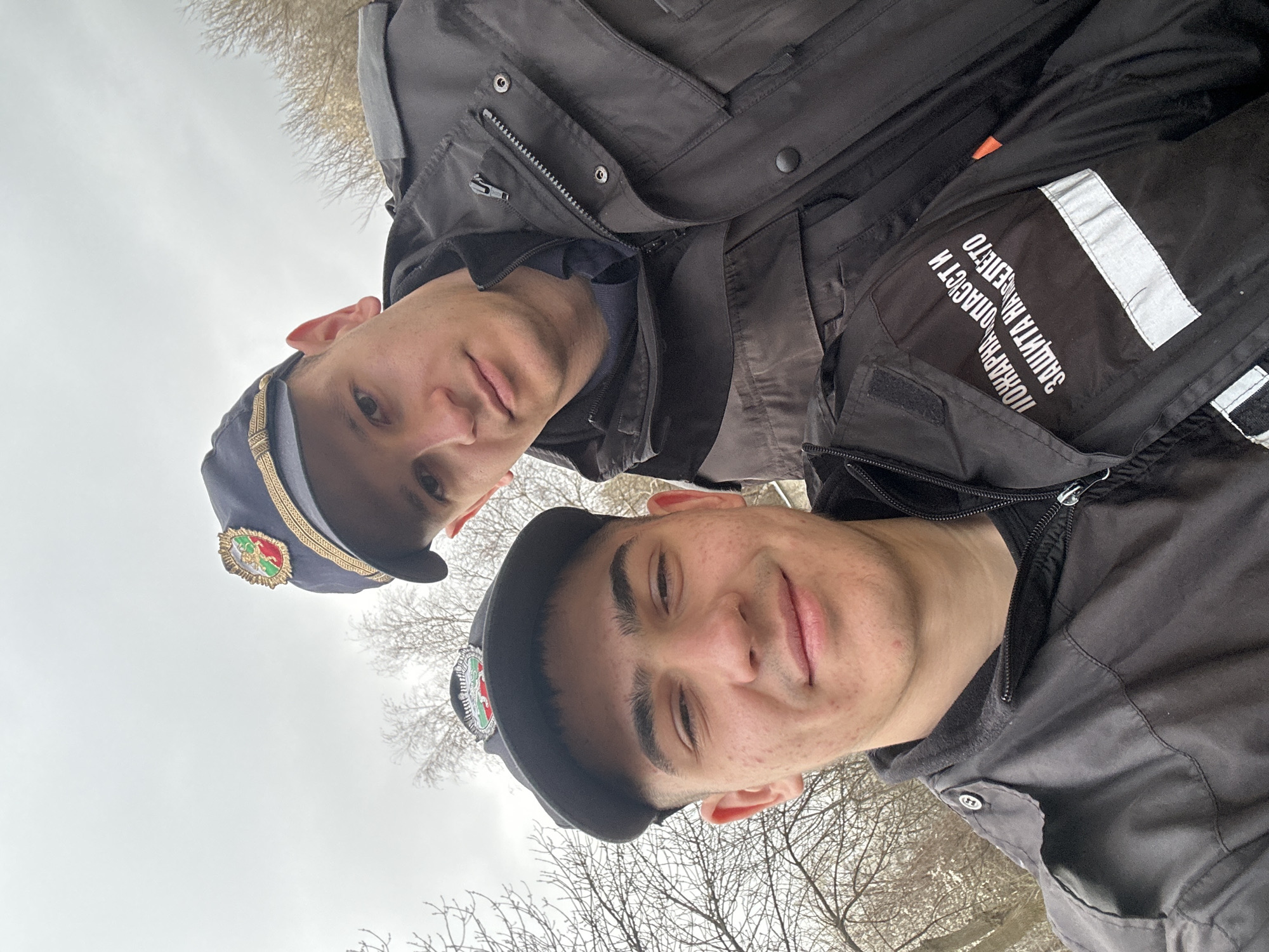 Two uniformed men pose for selfie in Sofia