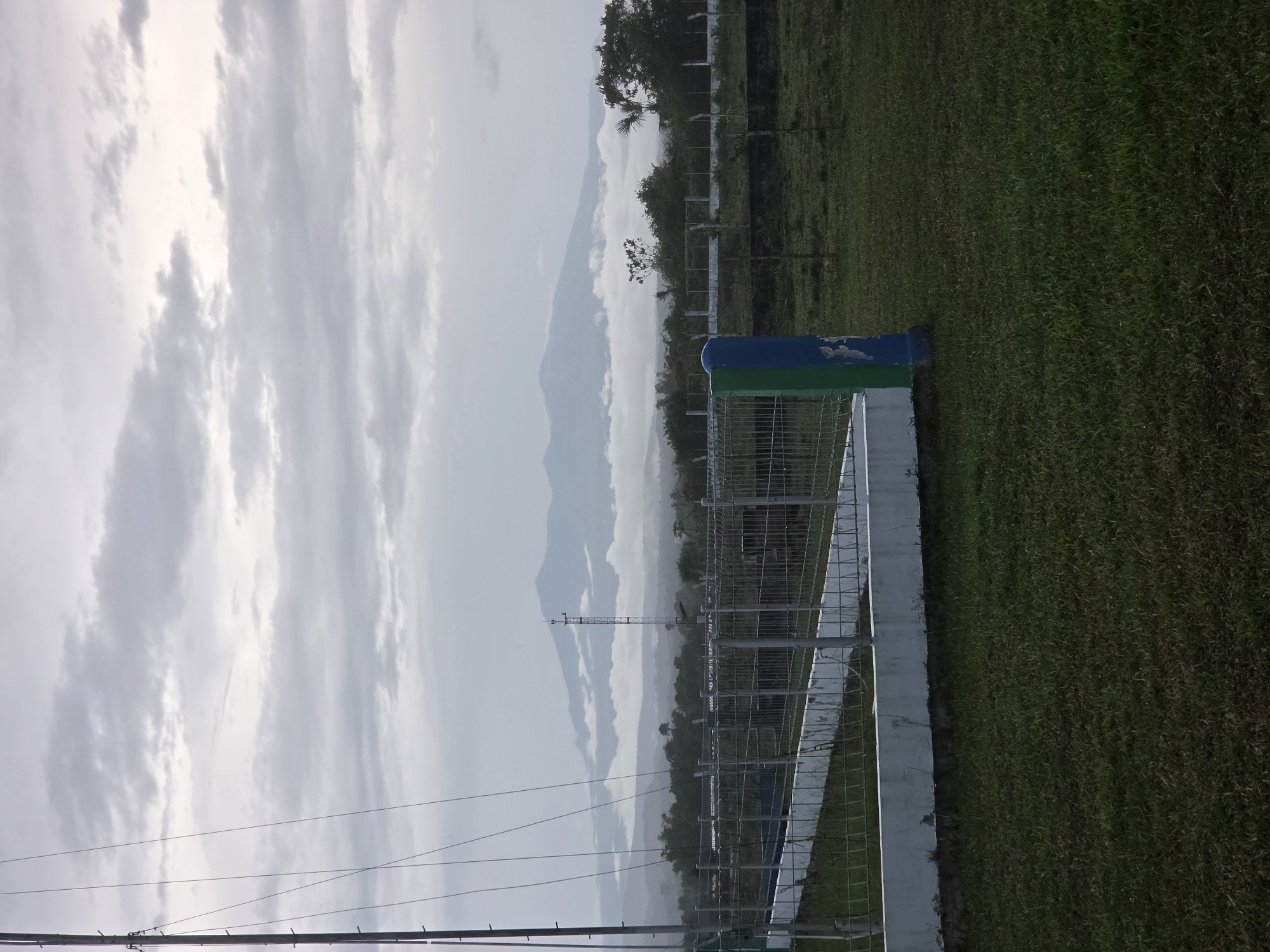 Rural landscape documented in Pintomakmur, Indonesia under overcast conditions
