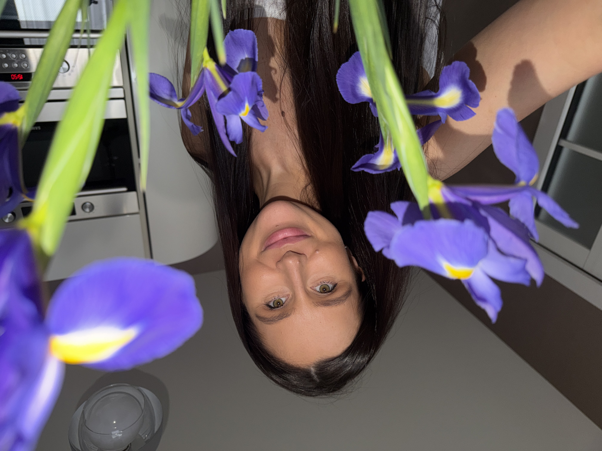 Woman photographed upside down in kitchen in Khimki