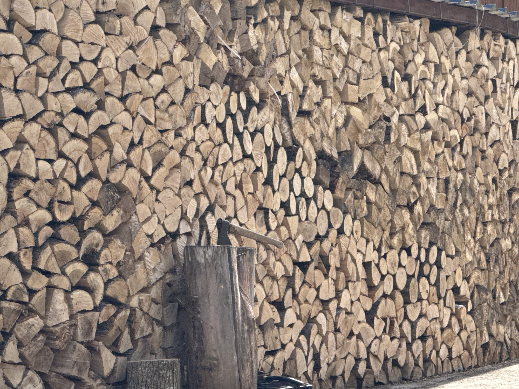 Firewood preparation scene captured in Villanova, Spain