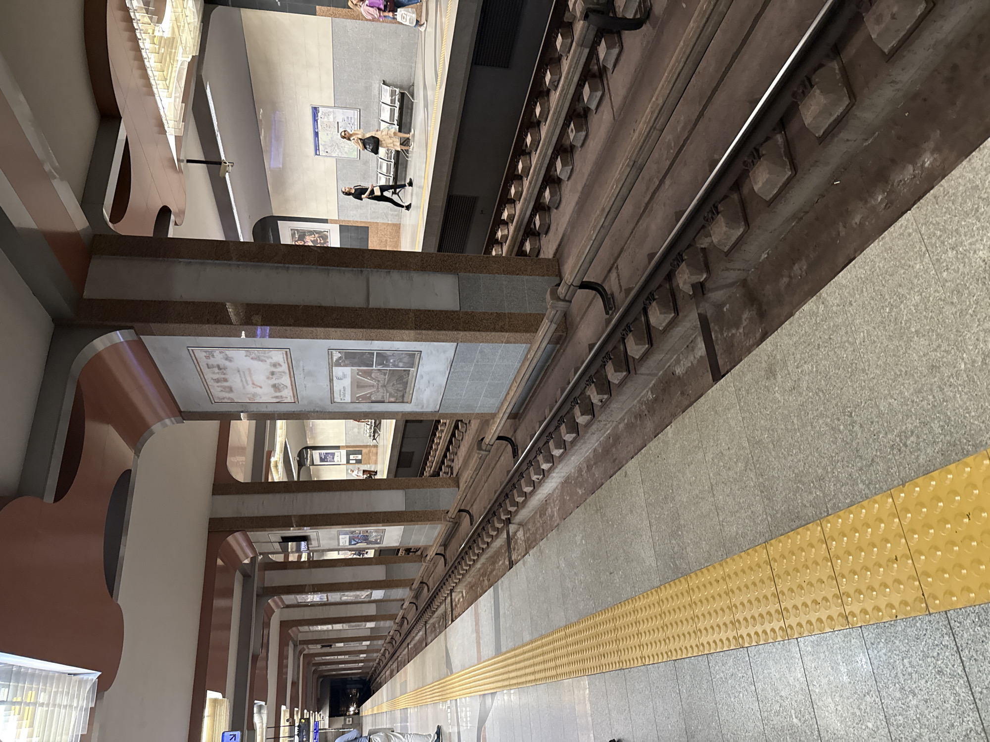 Passengers wait at Sofia metro station platform