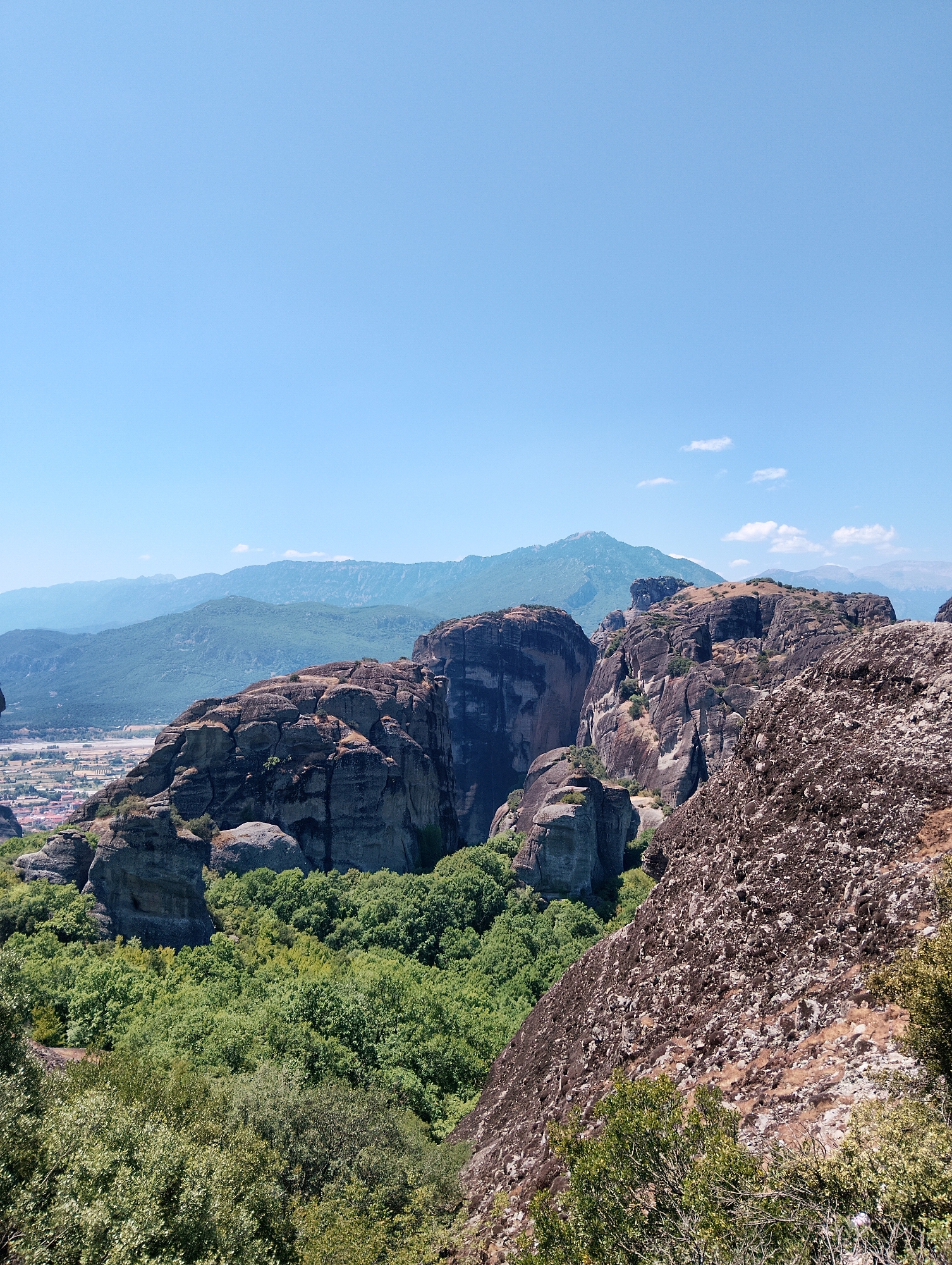 Meteora's rock pinnacles and cliff-top monasteries on a clear morning