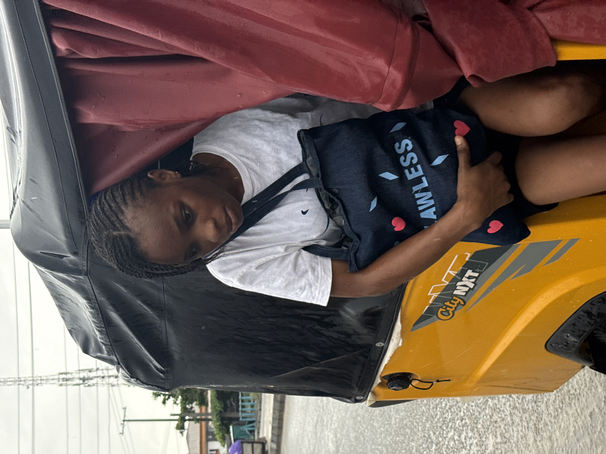 Rainy Morning Life Continues in Ado, Nigeria Streets