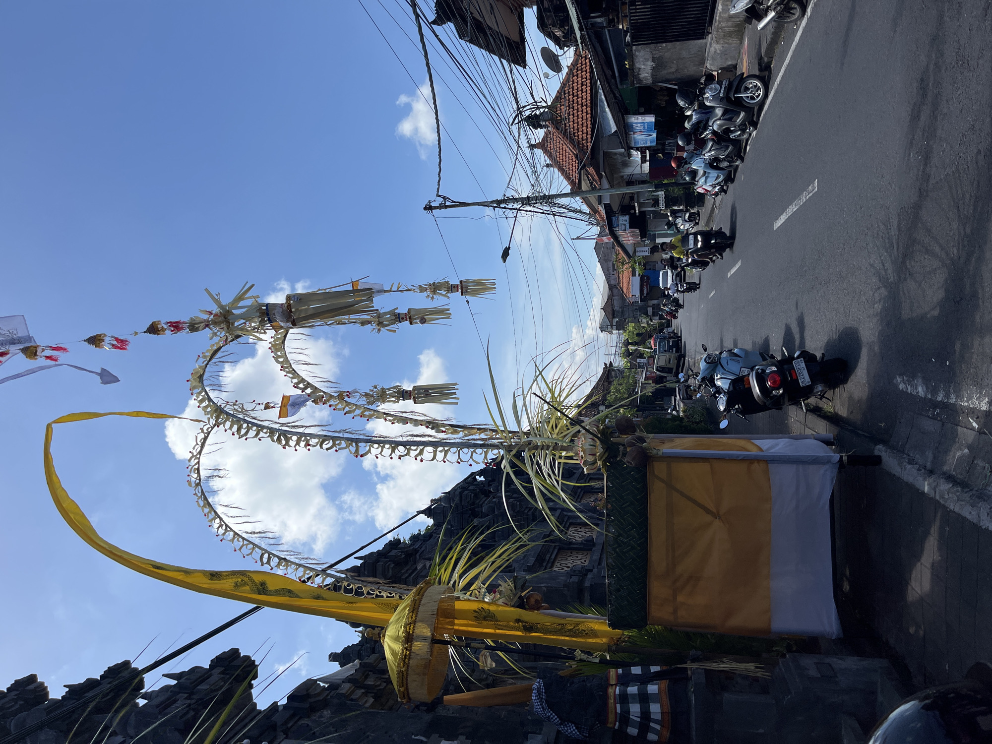 Traditional Balinese street decorations and temple observed in Kuta Selatan