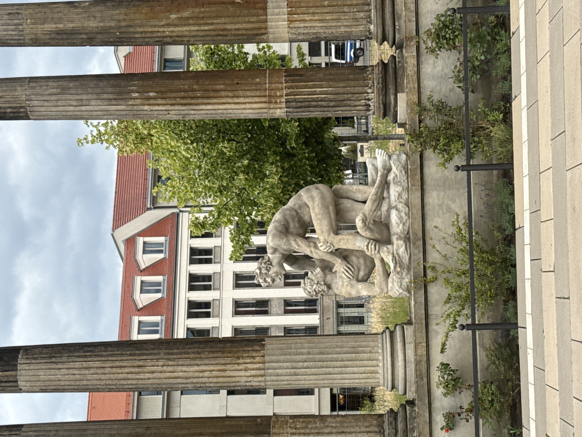 Tourist documents Potsdam's neoclassical architecture during brief city visit