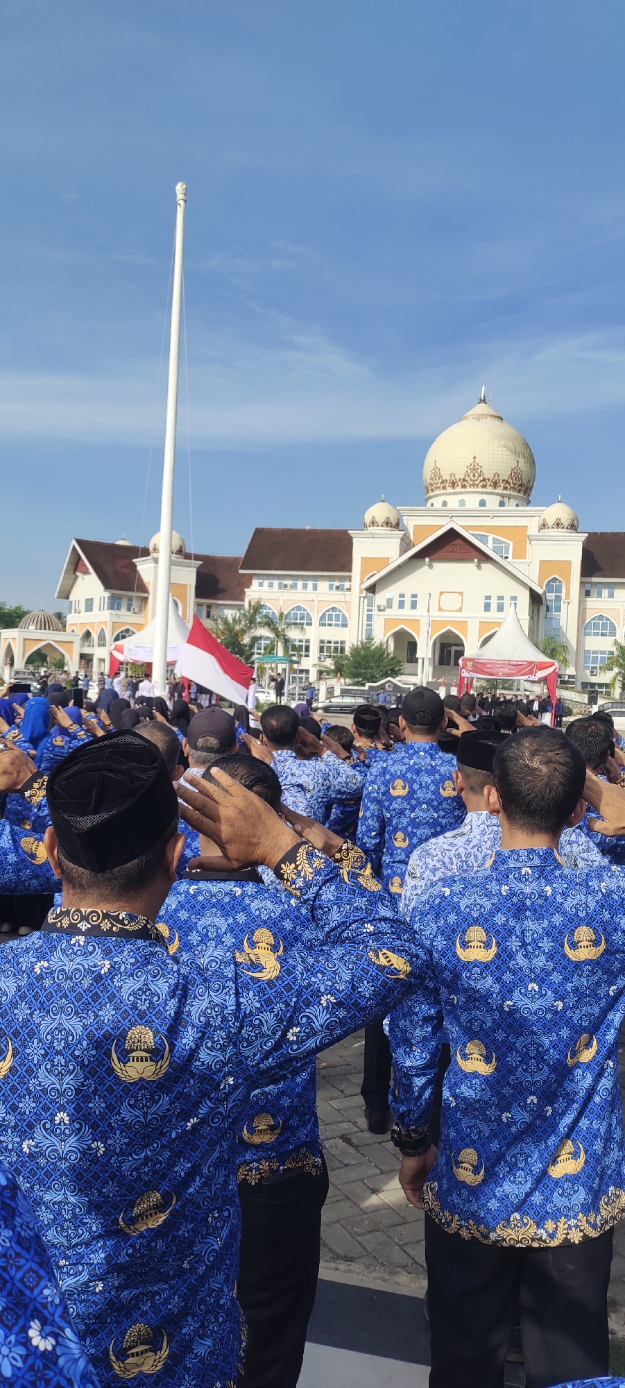 Formal ceremony with flag salute in Indonesian village