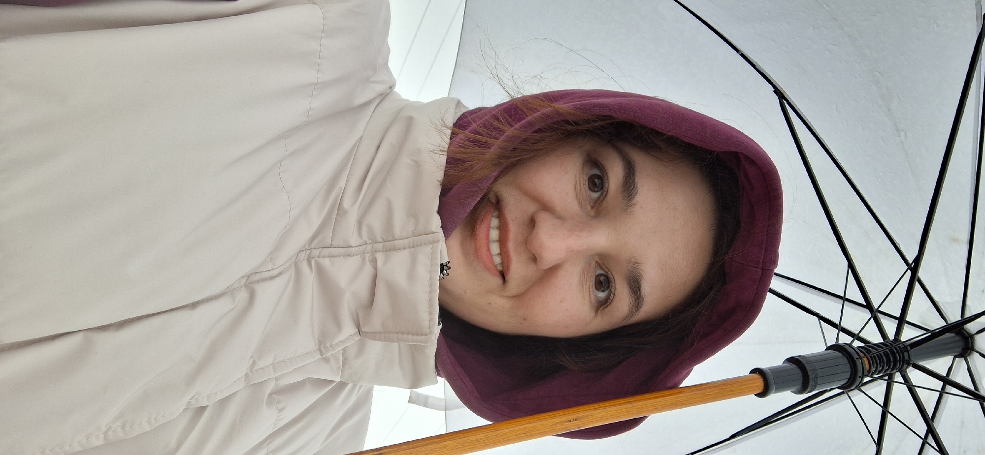Woman with umbrella poses for photo in Chernushka