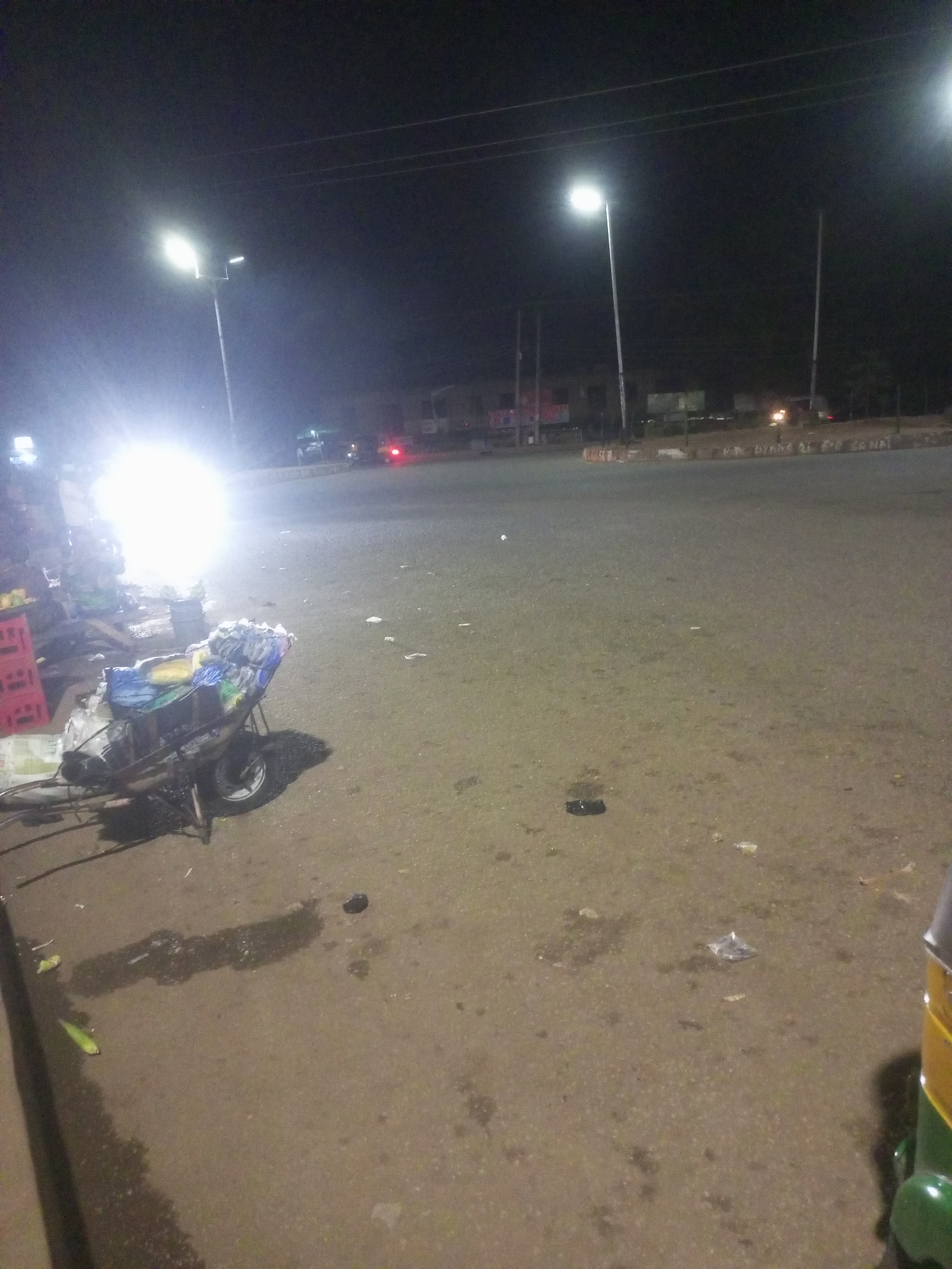 Nighttime street activity documented in Bukuru, Nigeria