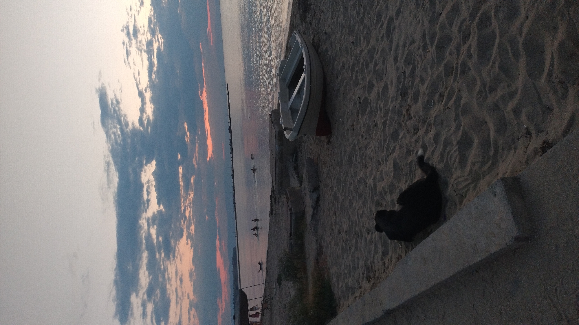 Dusk settles over Neoi Epivates beach and harbor