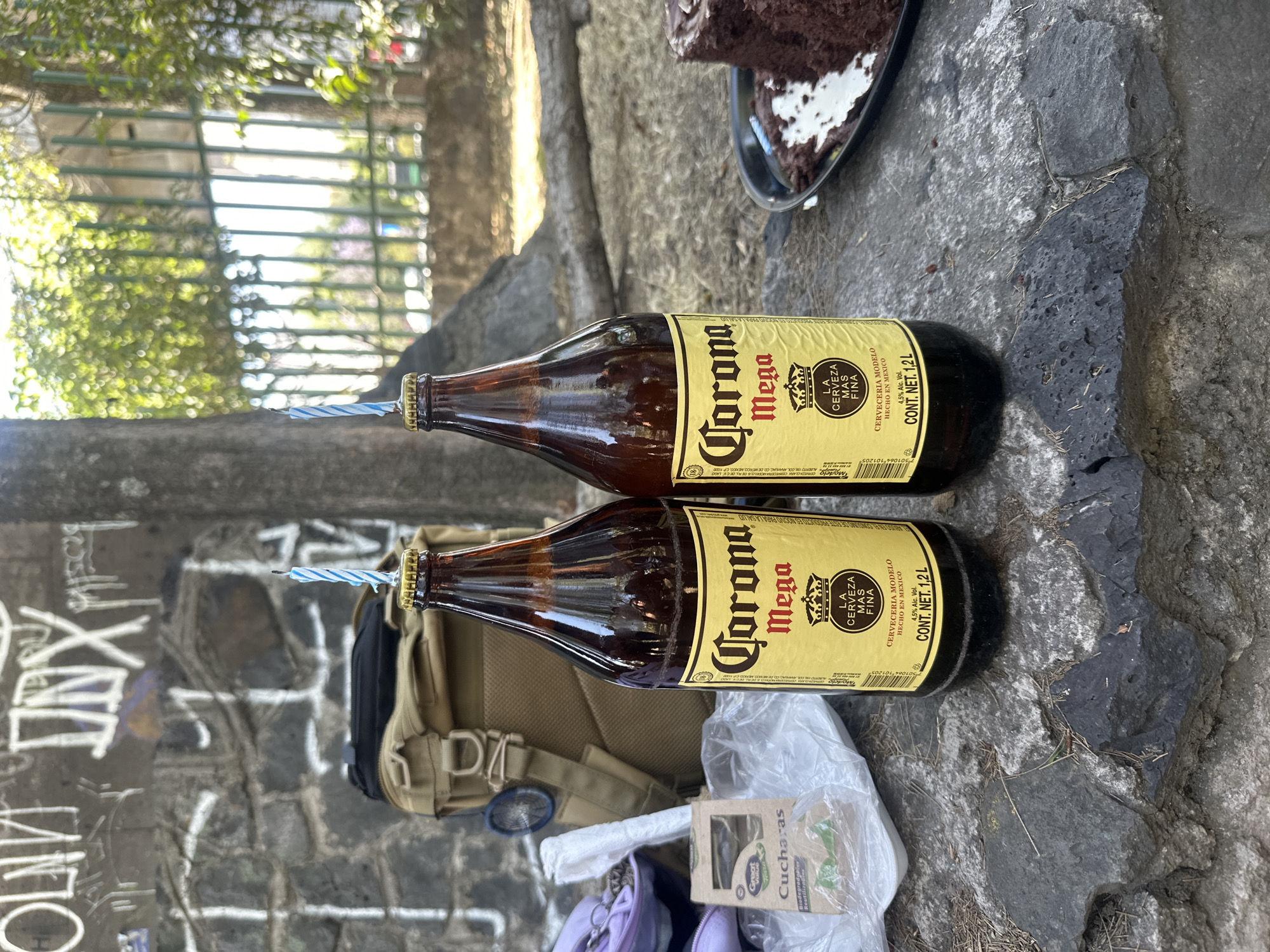 Birthday celebration features Corona beer bottles with candles in Mexico City