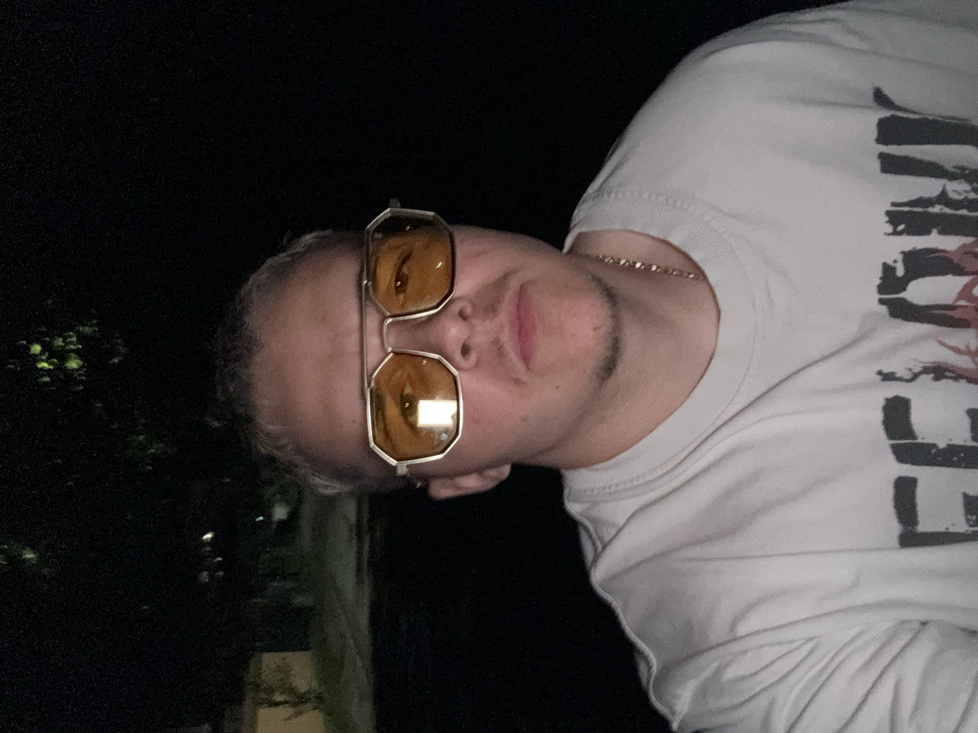 Young man documents nighttime selfie session in Kostinbrod