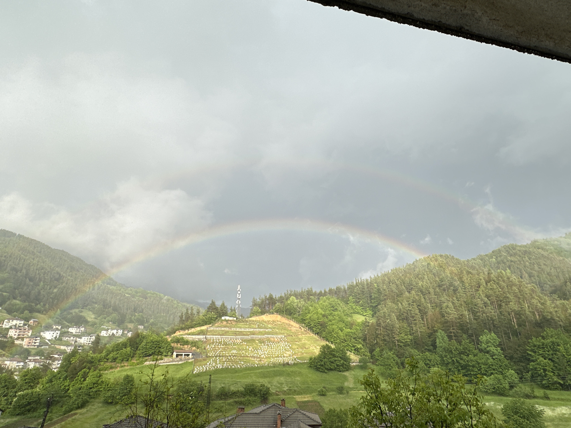 Rainbow arcs over Bulgarian village of Chepintsi