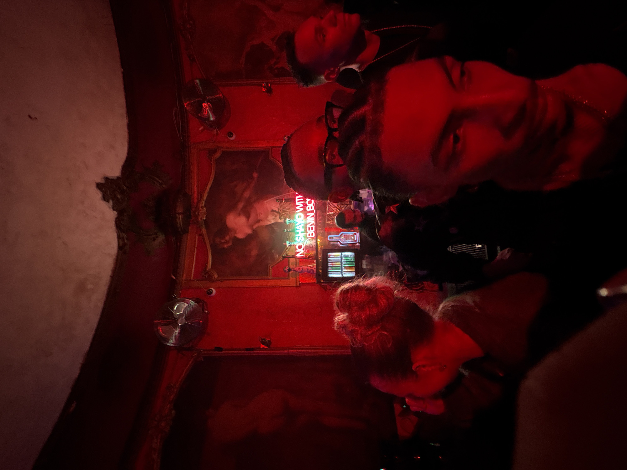 Late night socializing captured at Paris bar