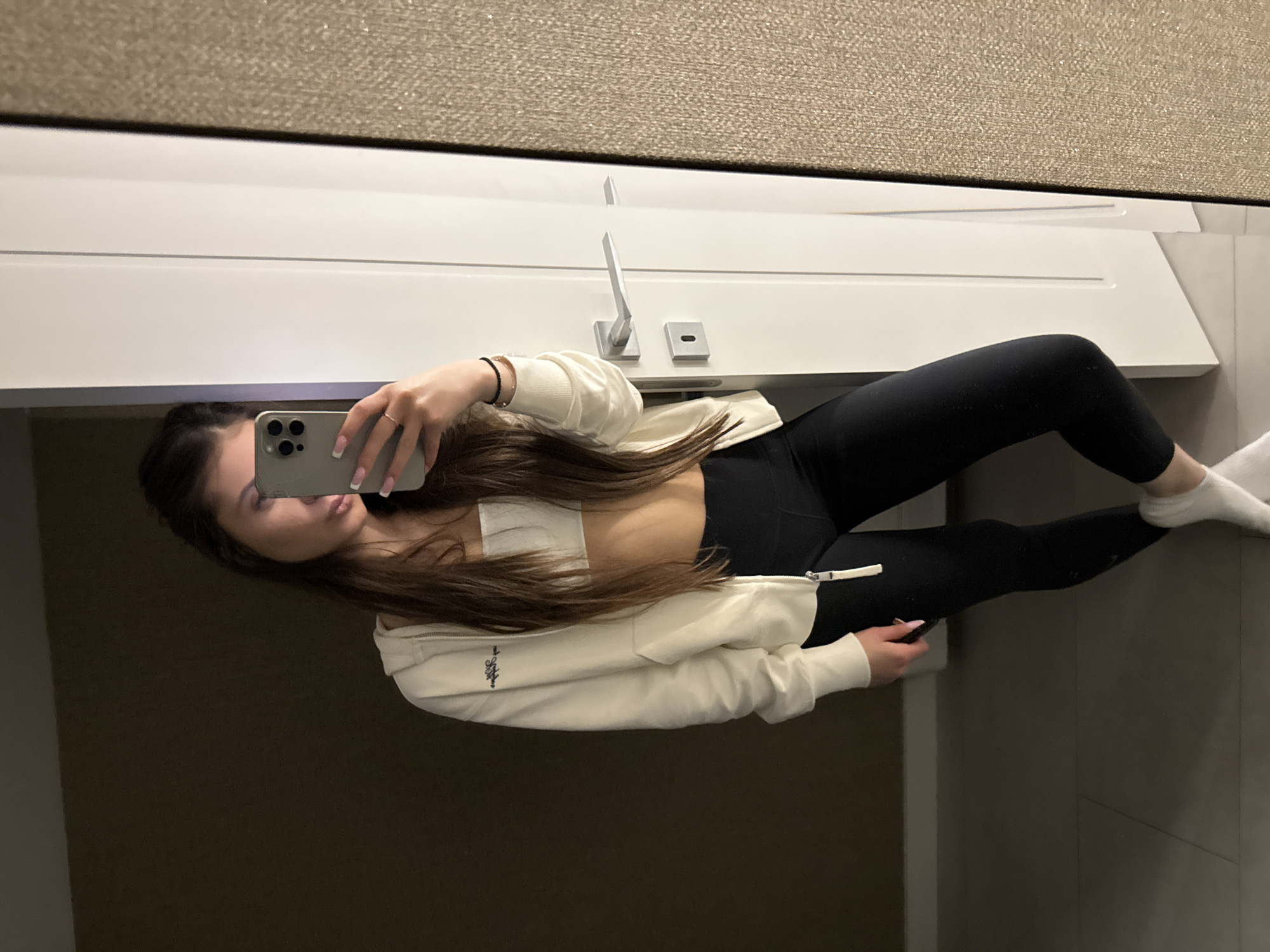 Woman takes multiple selfies at home in Plovdiv