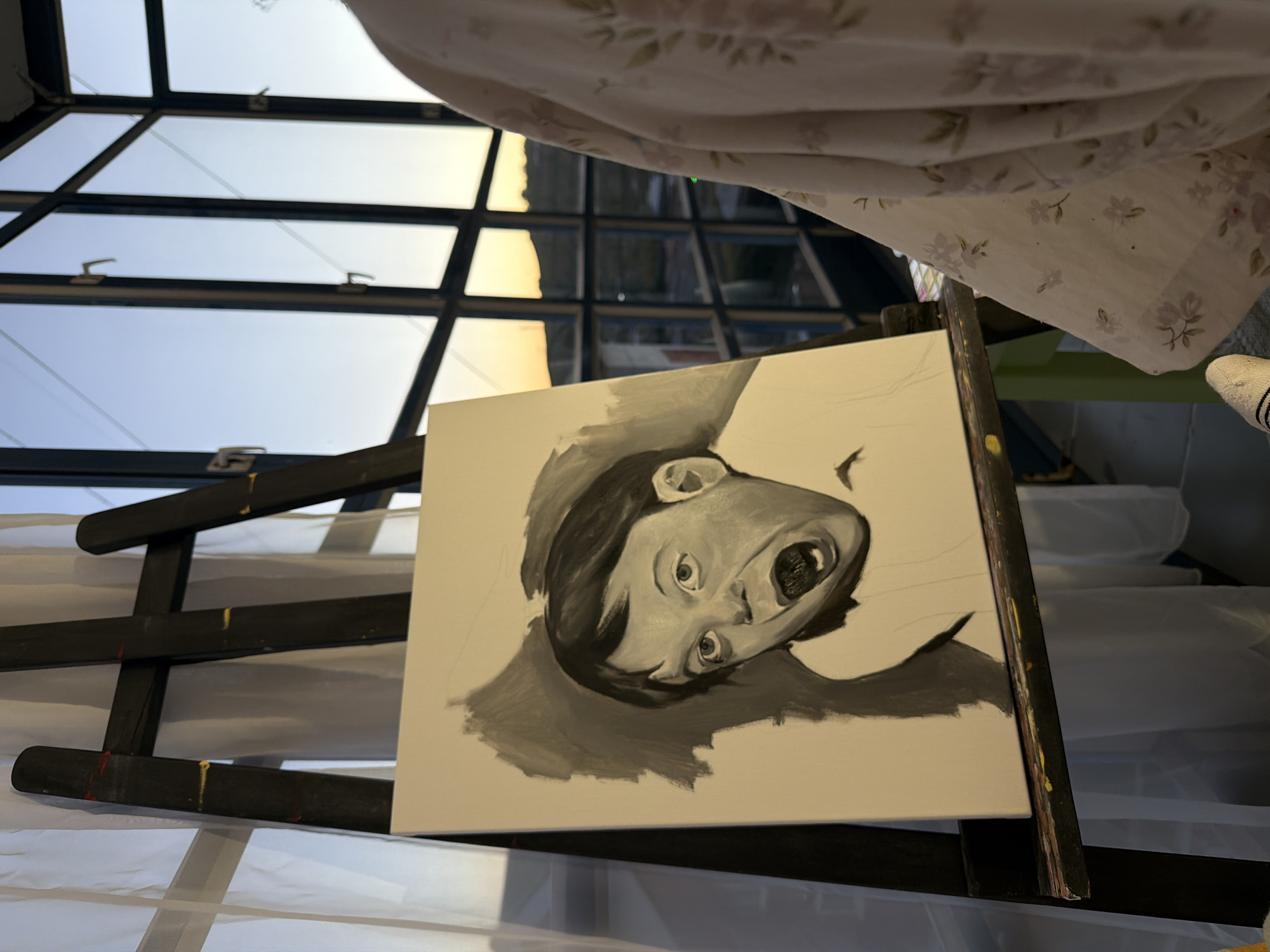 Grayscale portrait painting in progress, Krasnoyarsk studio