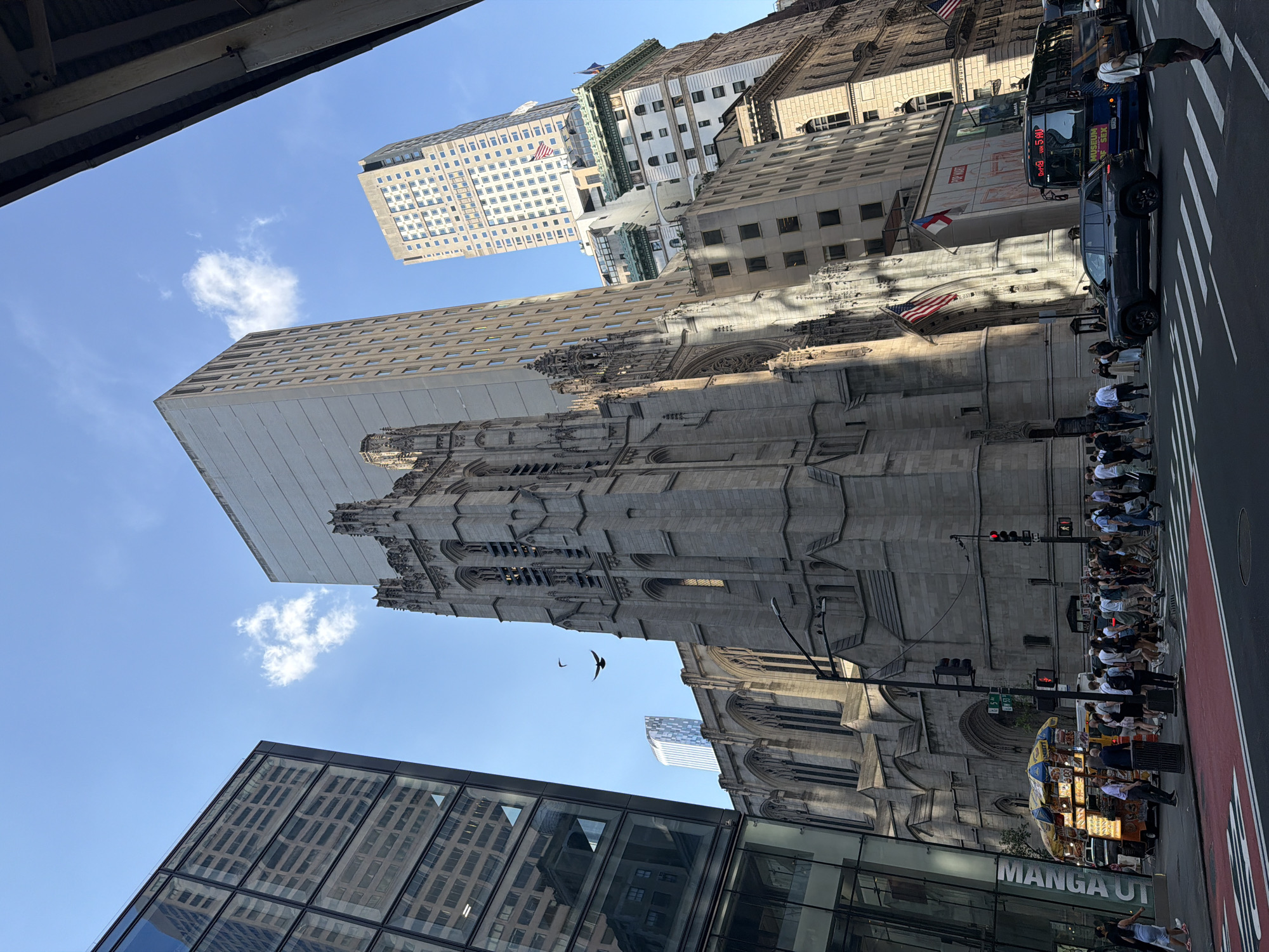 Street view captures Trinity Church amid NYC buildings