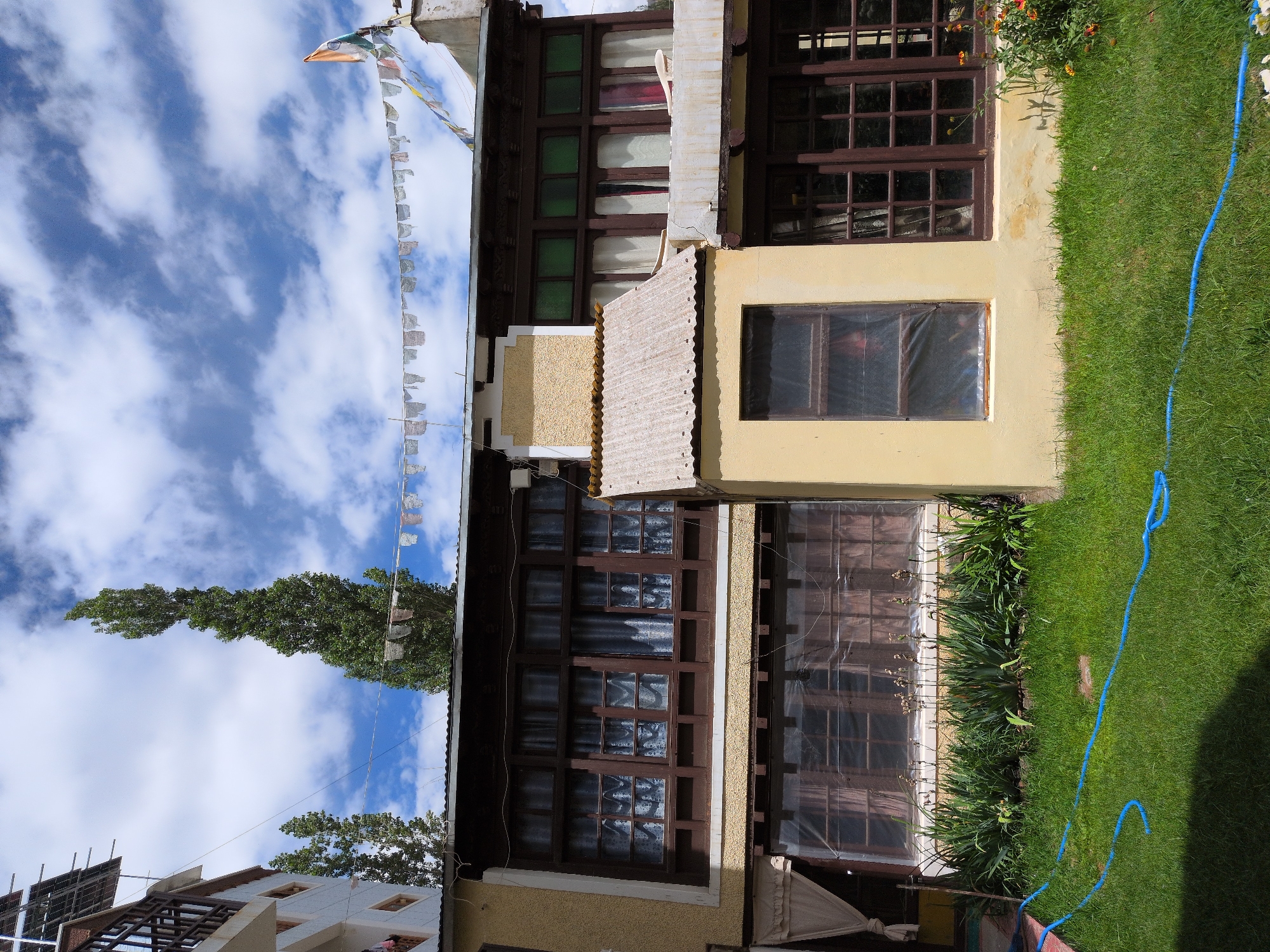 Morning tour of Leh guesthouses, gardens, and mountain-town streets
