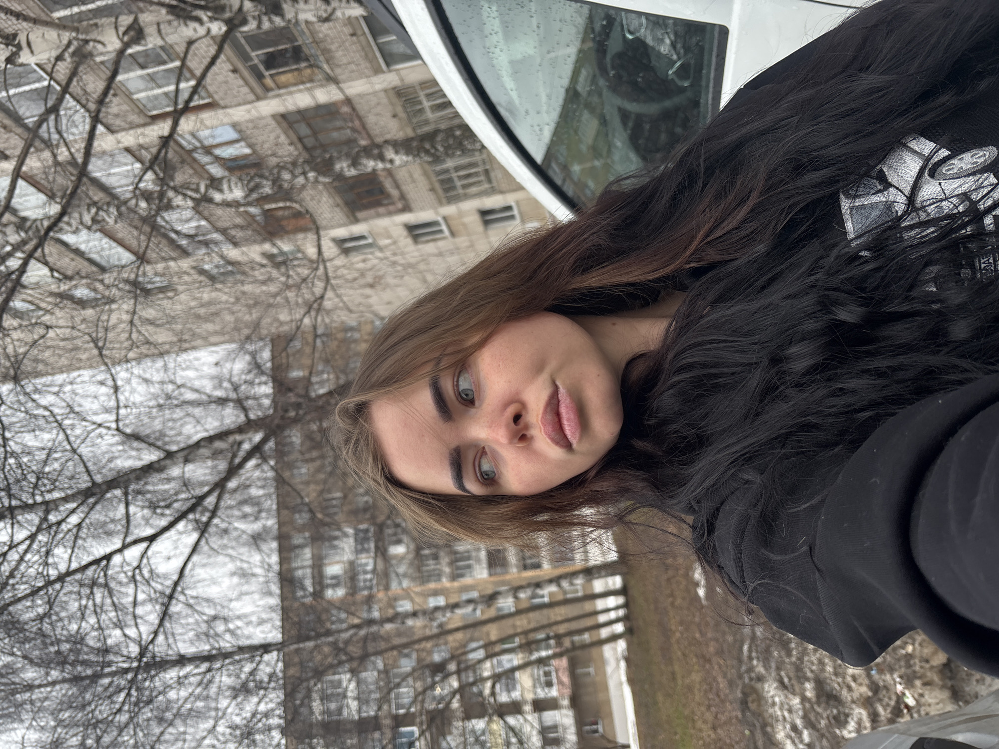Woman takes selfie amid spring thaw in Izhevsk