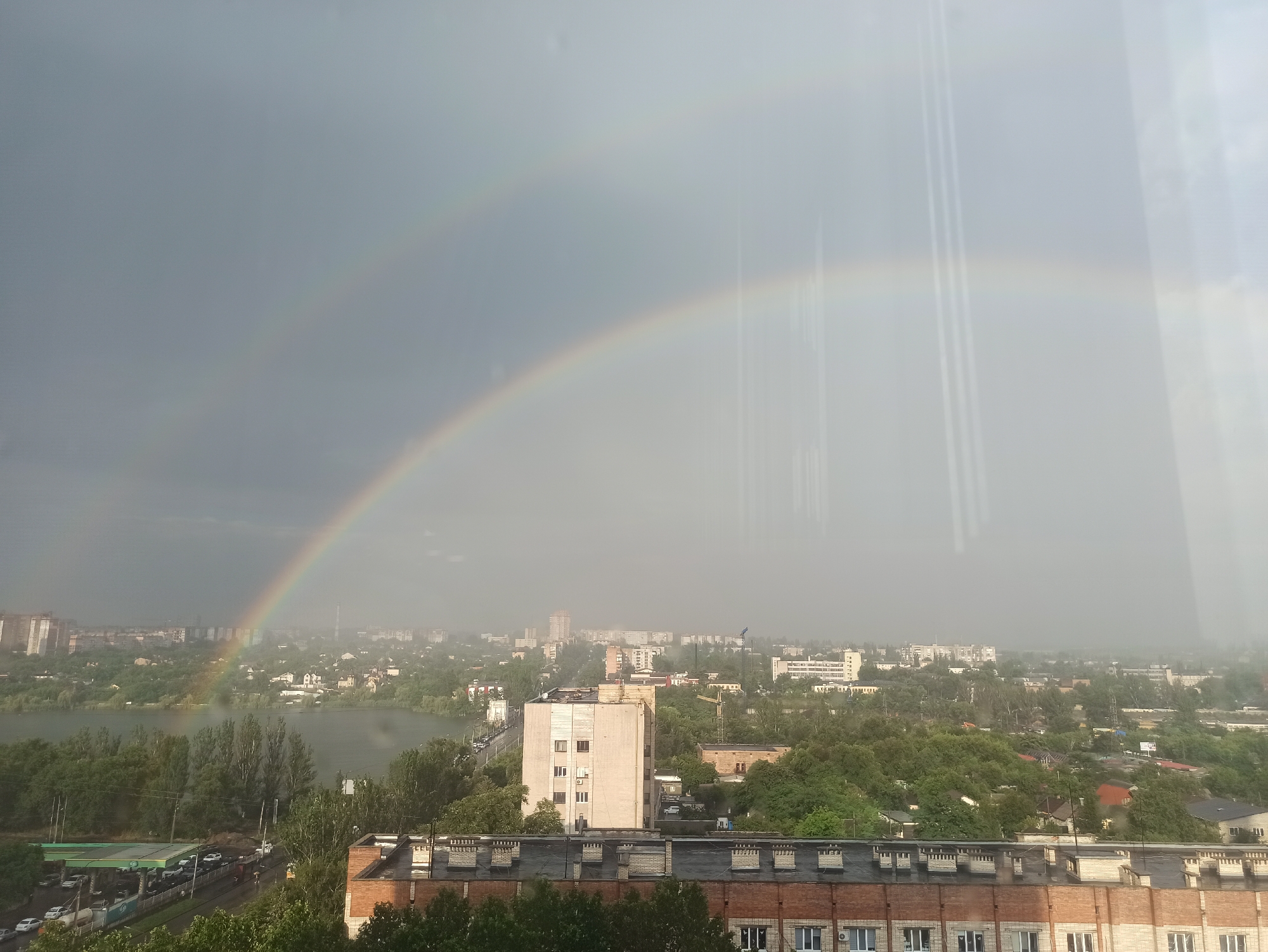 Double rainbow over the city, plus a nearby indoor event