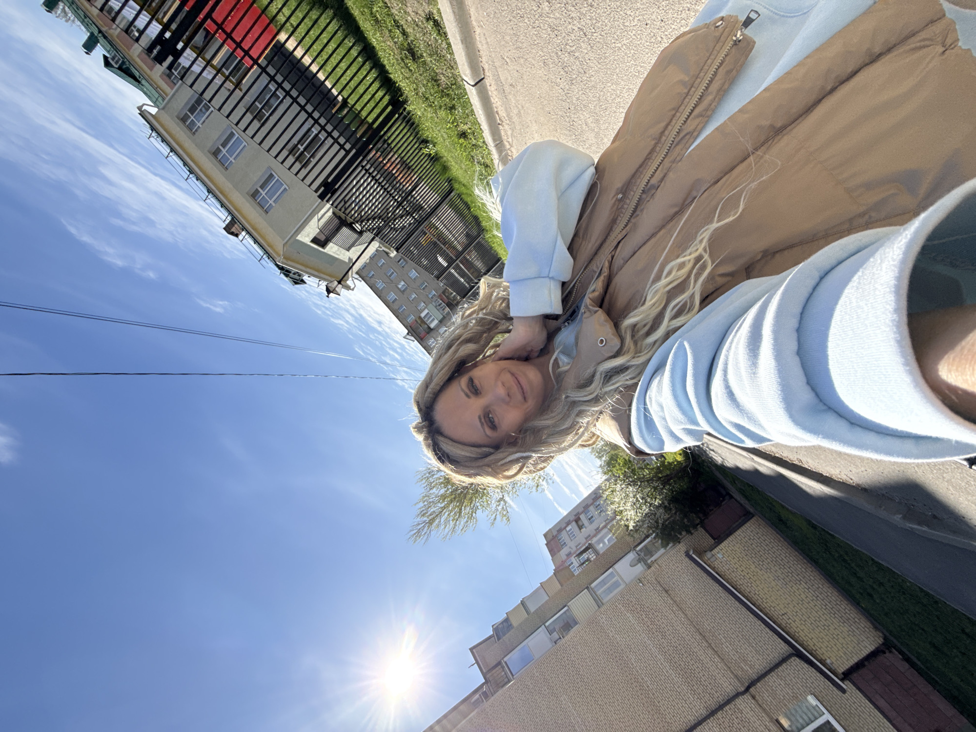 Woman and child take morning selfies in Заволжье