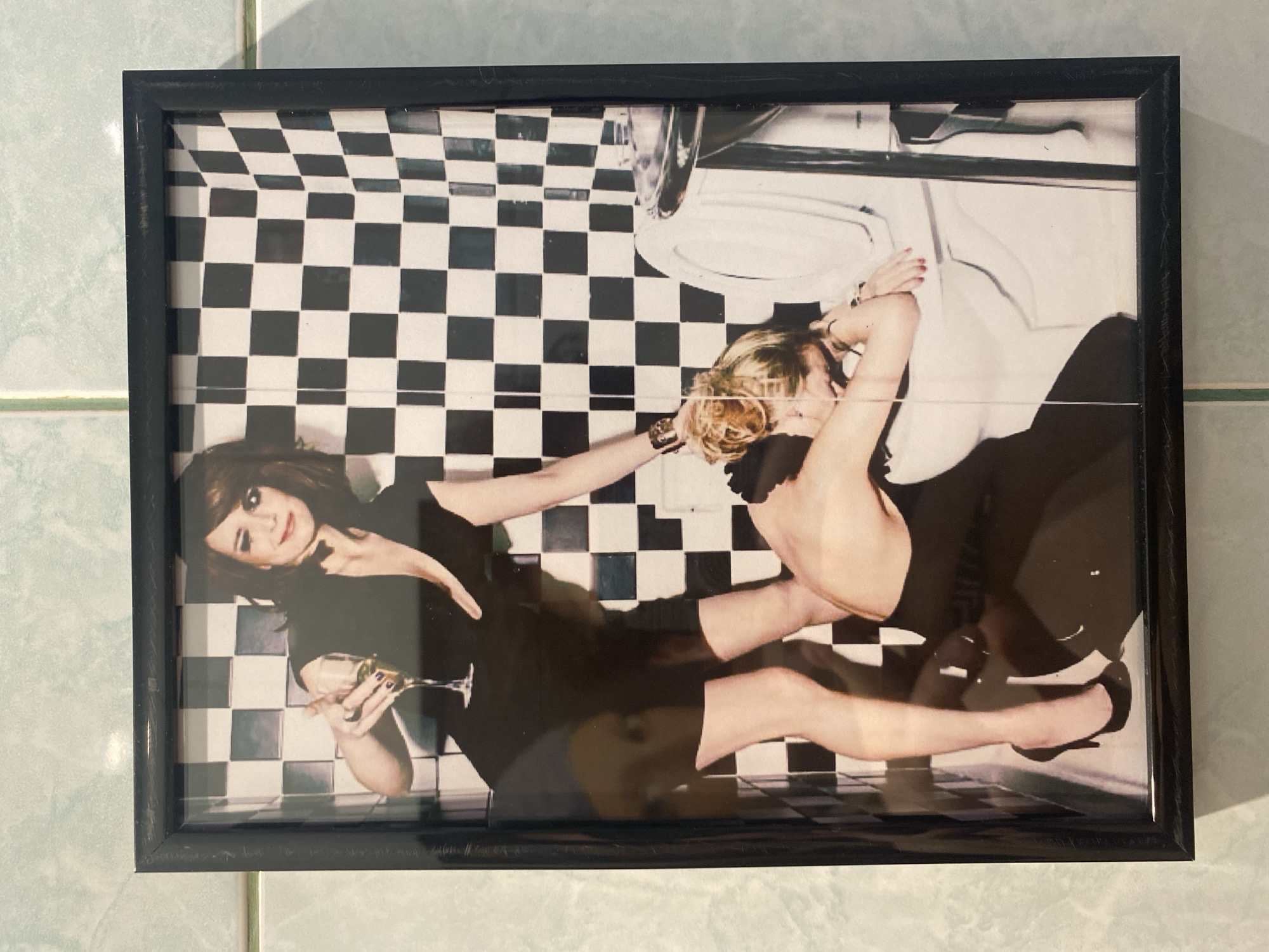 Framed bathroom photograph with champagne observed in Krasnoyarsk